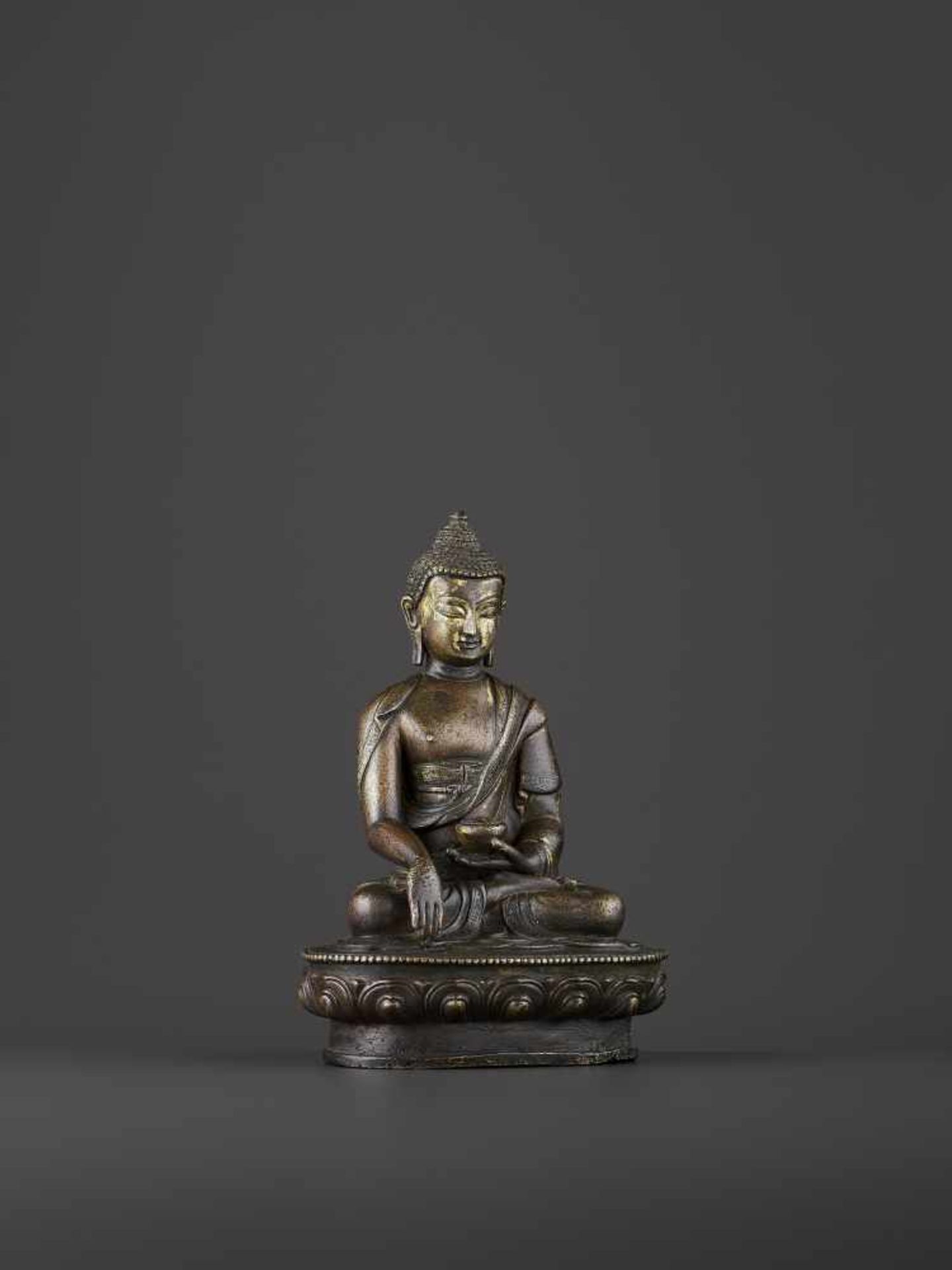 A BRONZE BUDDHA SHAKYMUNI, QING China, 18th century. The figure seated on a beaded lotus base in - Image 6 of 8