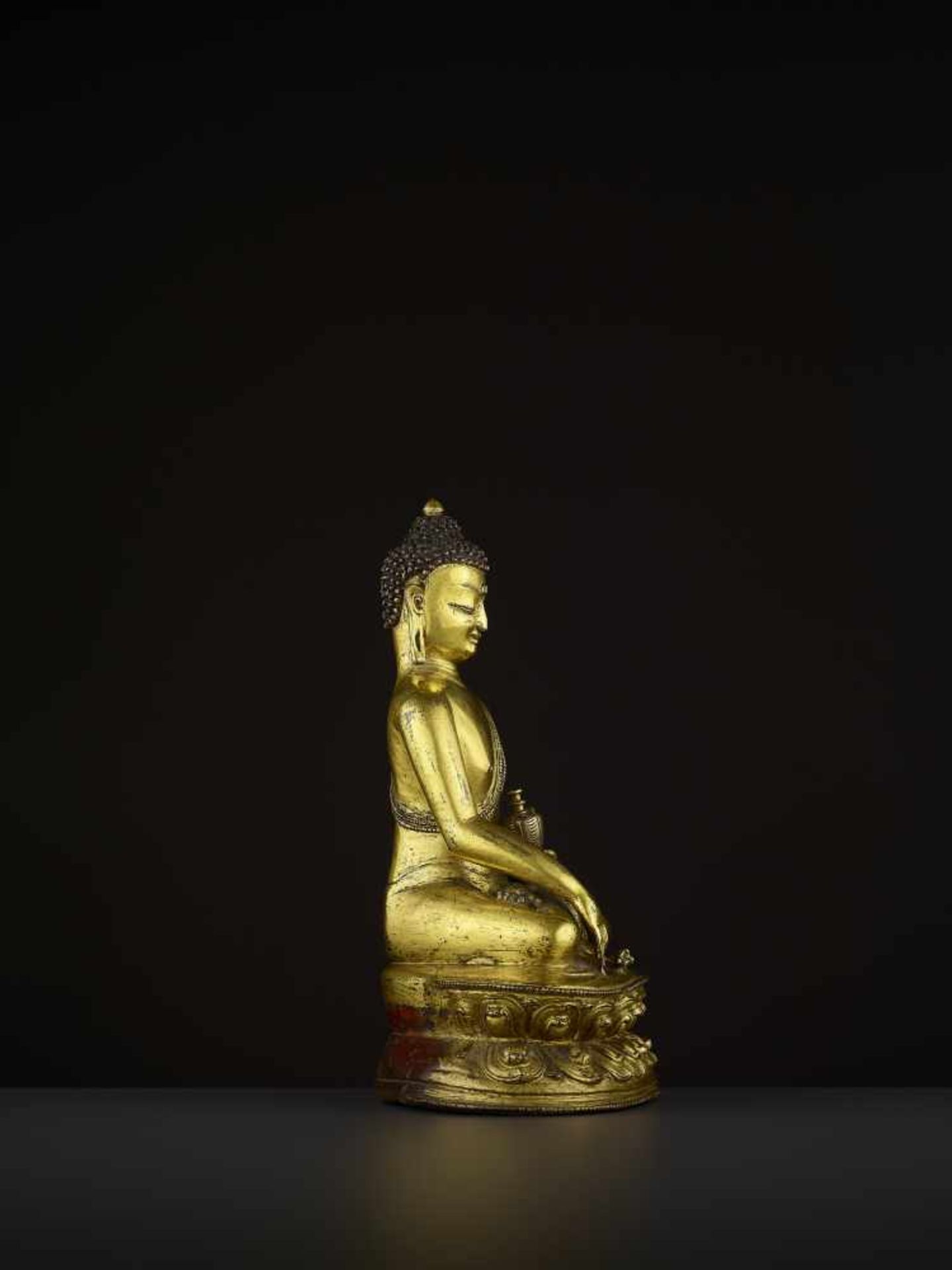 A GILT BRONZE BUDDHA VAJRASANA Tibet, 14th - 16th century. A superb fire-gilt bronze of Buddha - Image 8 of 14