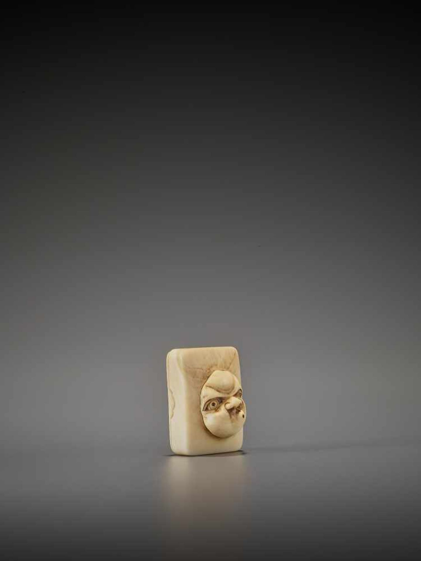 DORAKU: AN IVORY NETSUKE OF A MASK BOX WITH USOFUKI By Doraku(Sai), signed DorakuJapan, Osaka, - Image 8 of 10