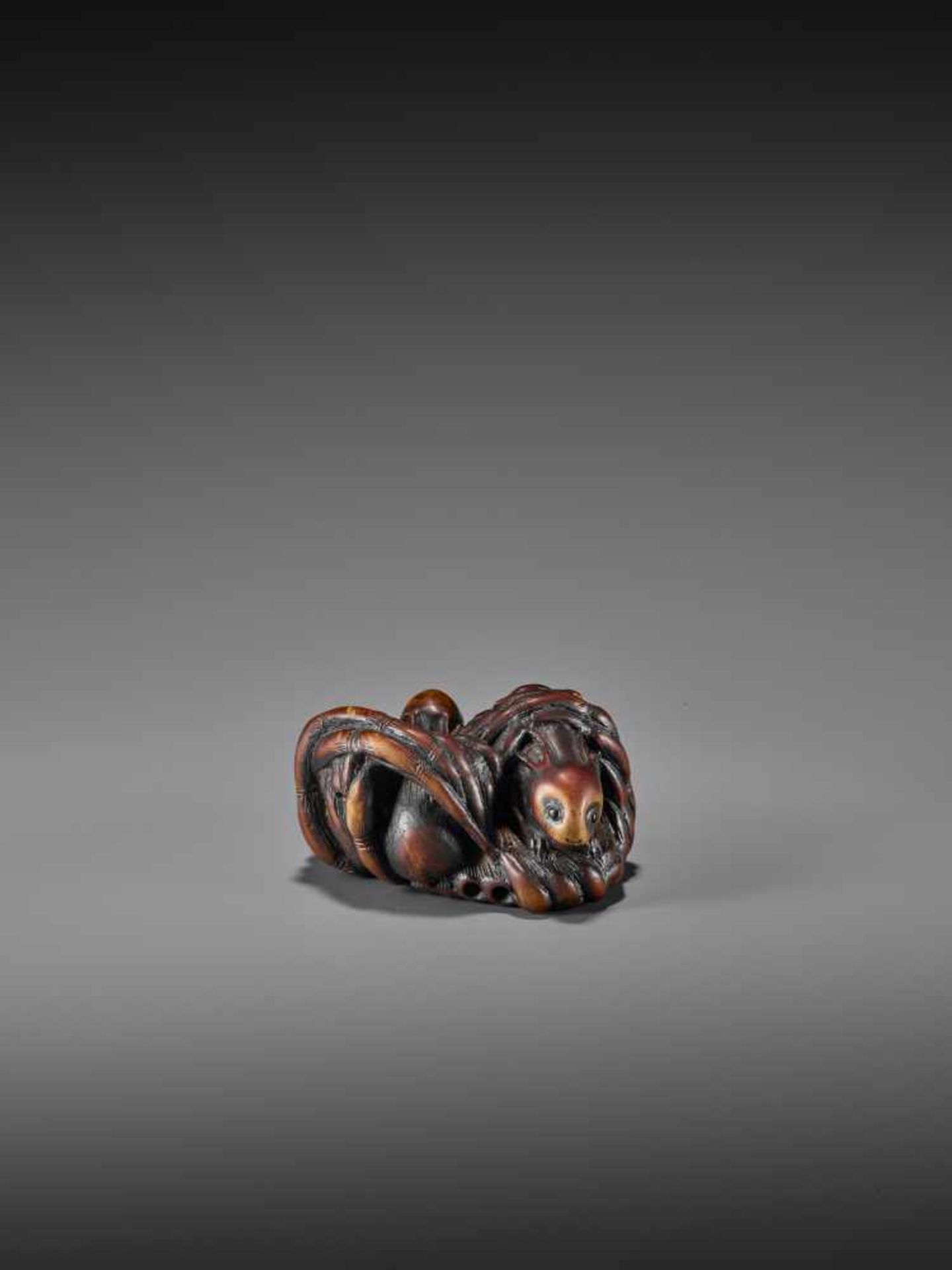 GEKKO: A RARE WOOD NETSUKE OF RABBITS IN BAMBOO By Gekko, signed GekkoJapan, 19th century, Edo