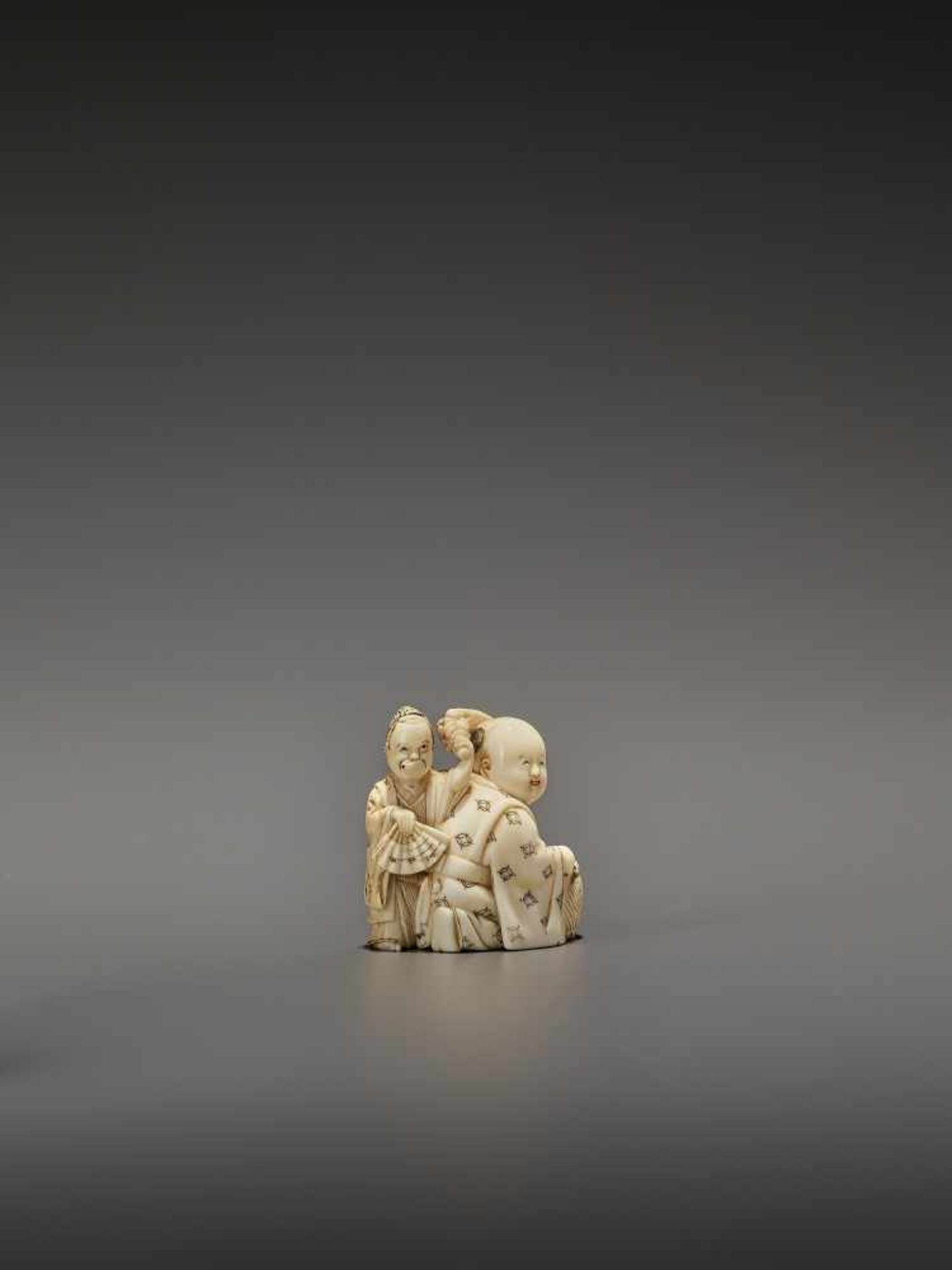 HOMIN: AN IVORY NETSUKE OF TWO BOYS AS MUSICIANS By Homin, signed Homin with kaoJapan, Edo/Tokyo, - Image 8 of 10