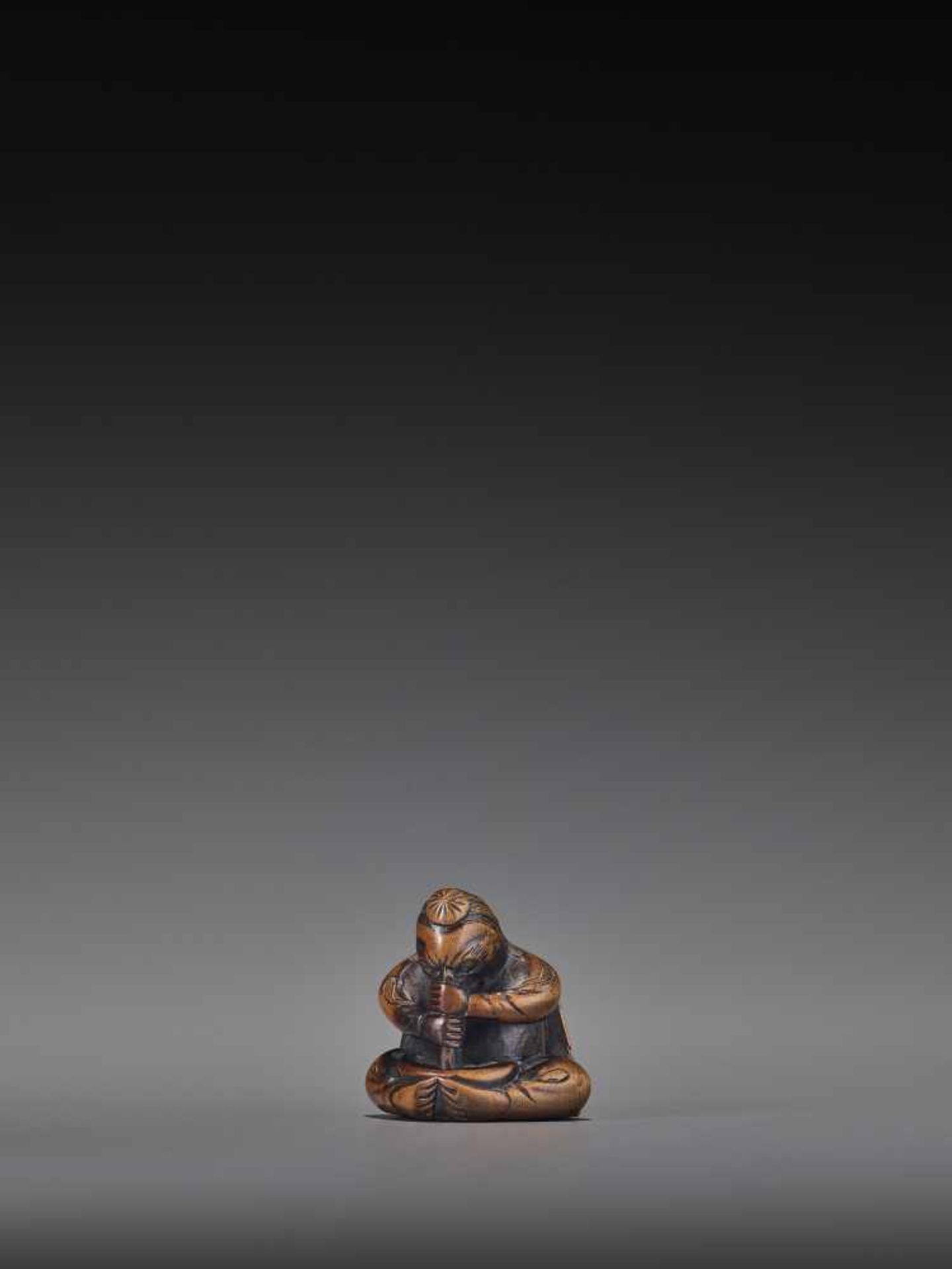 A WOOD NETSUKE OF A TENGU STIRRING MISO UnsignedJapan, 19th century, Edo period (1615-1868)A wood - Image 3 of 9