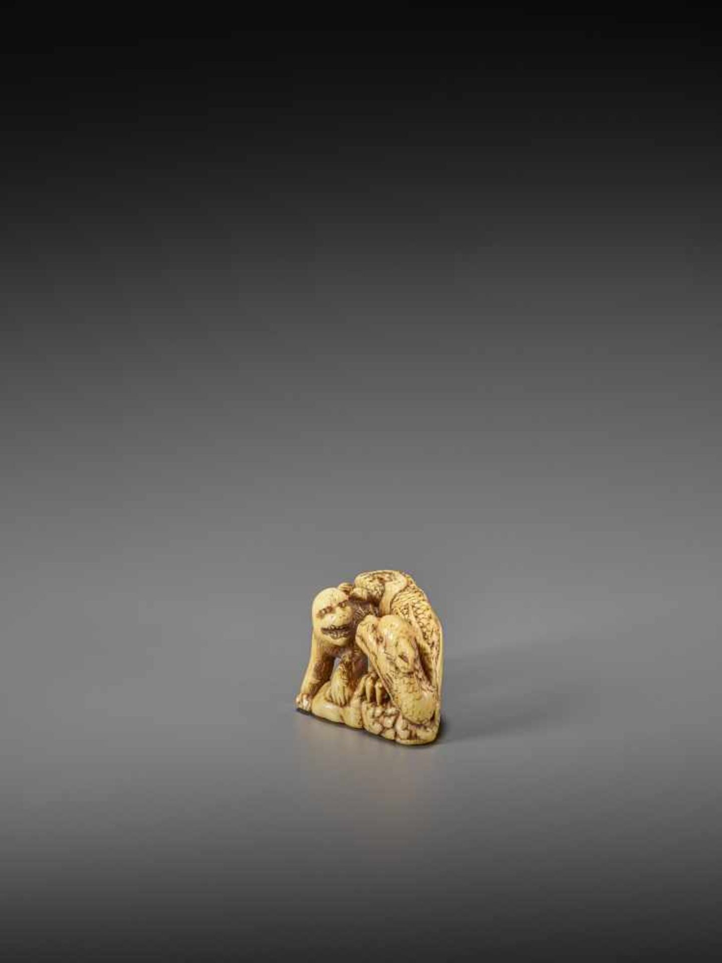 MINSEI: A POWERFUL IVORY NETSUKE OF A CONFRONTING DRAGON AND TIGER By Minsei, signed MinseiJapan, - Image 3 of 10