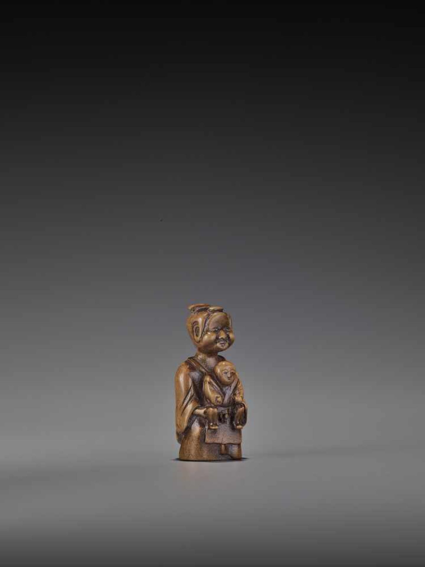 A RARE WOOD ‘DOUBLE SHUNGA’ NETSUKE OF A MOTHER AND CHILD UnsignedJapan, 18th century, Edo period ( - Image 8 of 8