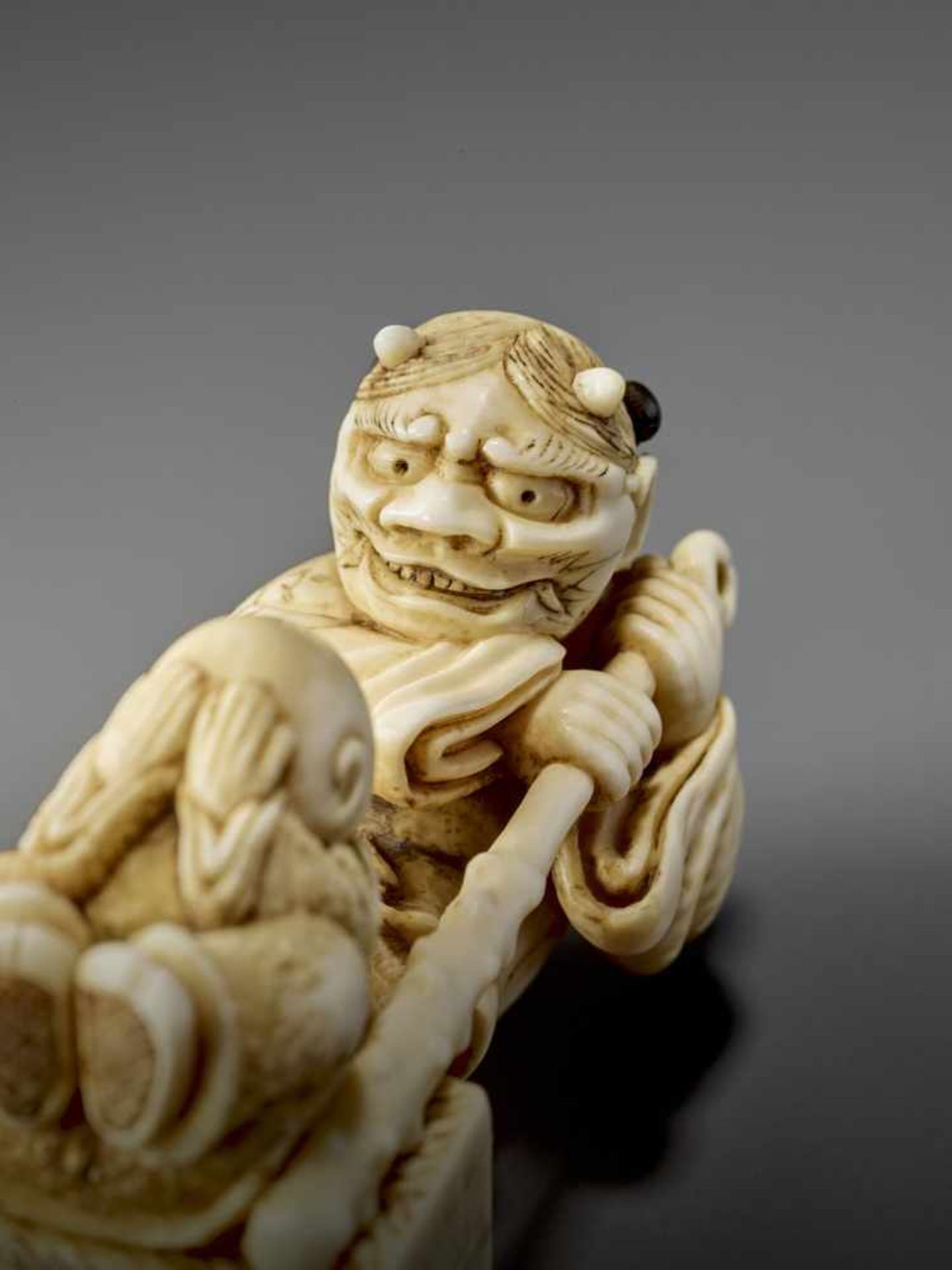 MASAKAZU: IVORY NETSUKE OF A KARAKO SCARING A YOUNG MONK By Masakazu, signed MasakazuJapan, Osaka, - Image 2 of 11