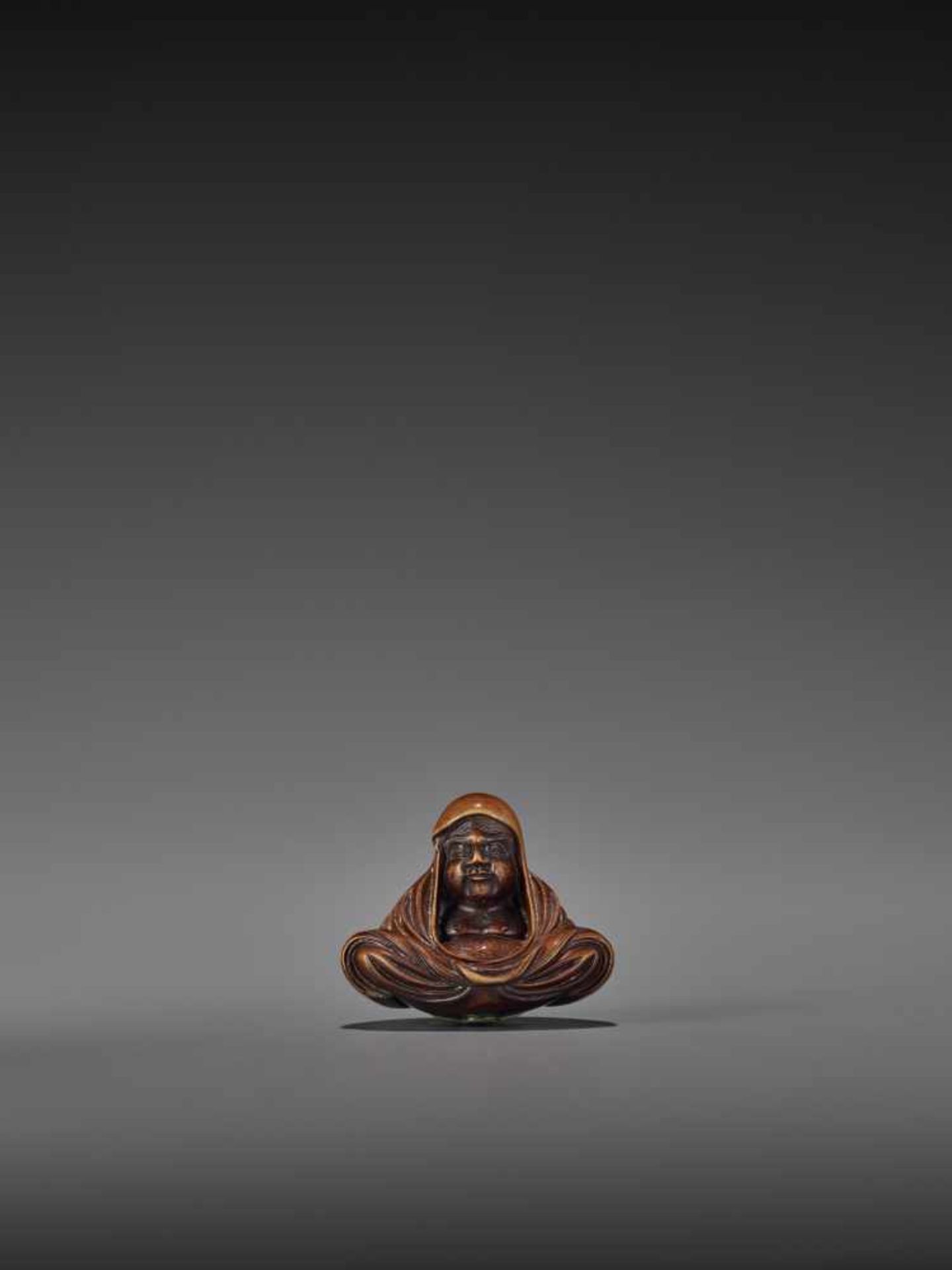 SHUMIN: A FINE WOOD NETSUKE OF DARUMA By Hara Shumin, signed ShuminJapan, Edo, early 19th century,