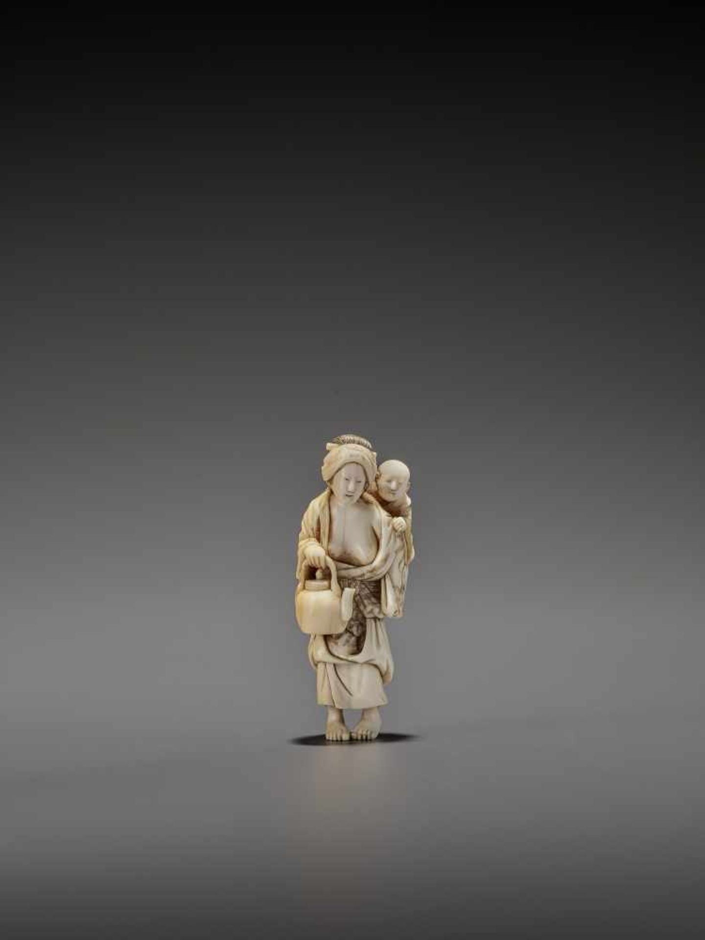 CHIKUYOSAI TOMOCHIKA: A MAGNIFICENT IVORY NETSUKE OF A MOTHER WITH CHILD By Chikuyosai Tomochika,