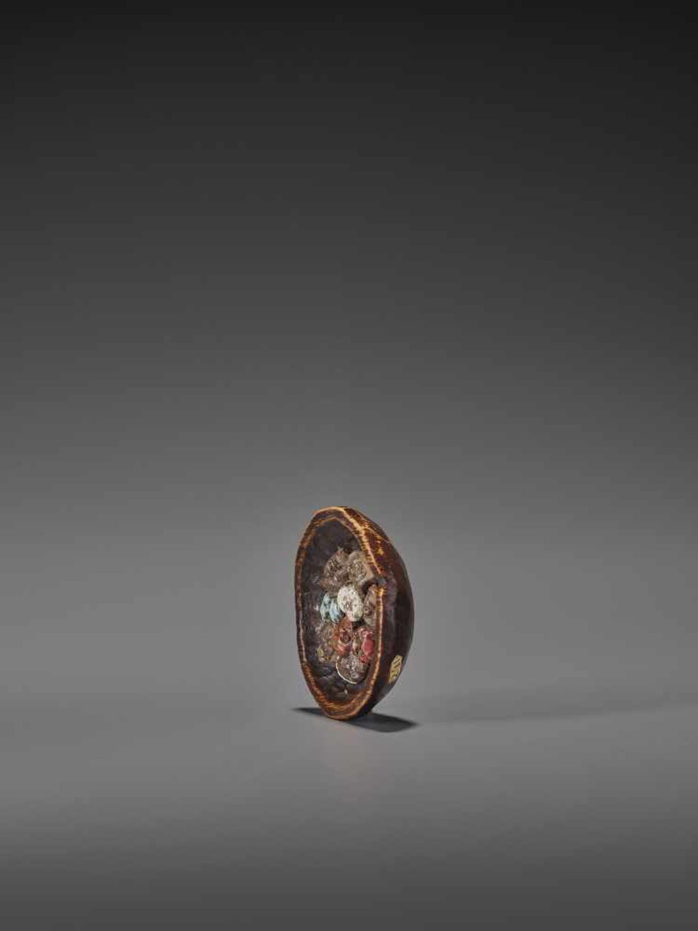 TEIJI: A RARE WOOD AND CERAMIC NETSUKE OF MANY MASKS By Teiji, signed TeijiJapan, Nagoya, mid-19th - Image 2 of 9