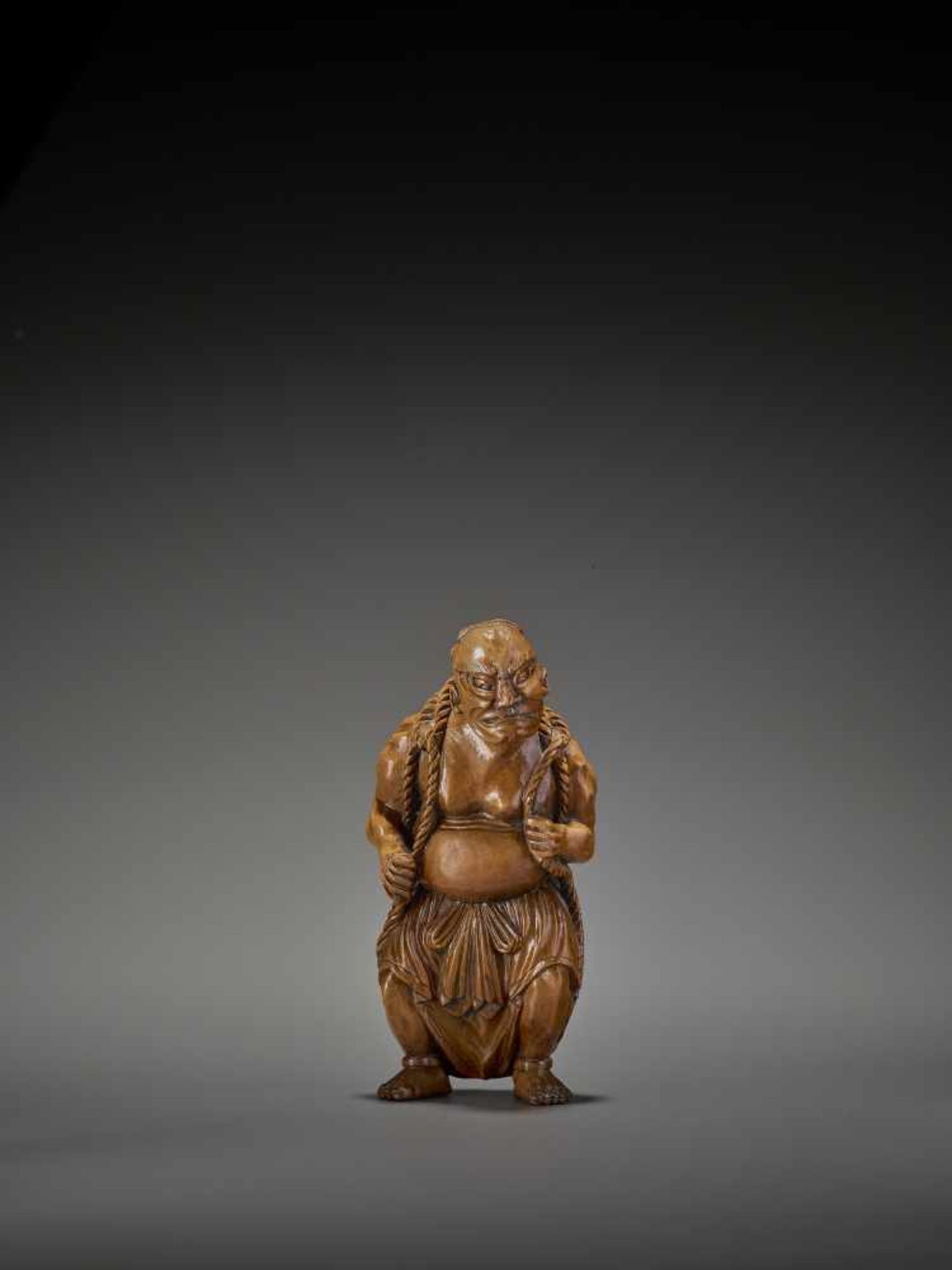 A RARE AND GIGANTIC ACTOR’S WOOD NETSUKE OF A NIO WITH WARAJI UnsignedJapan, 19th century, Edo - Image 6 of 8