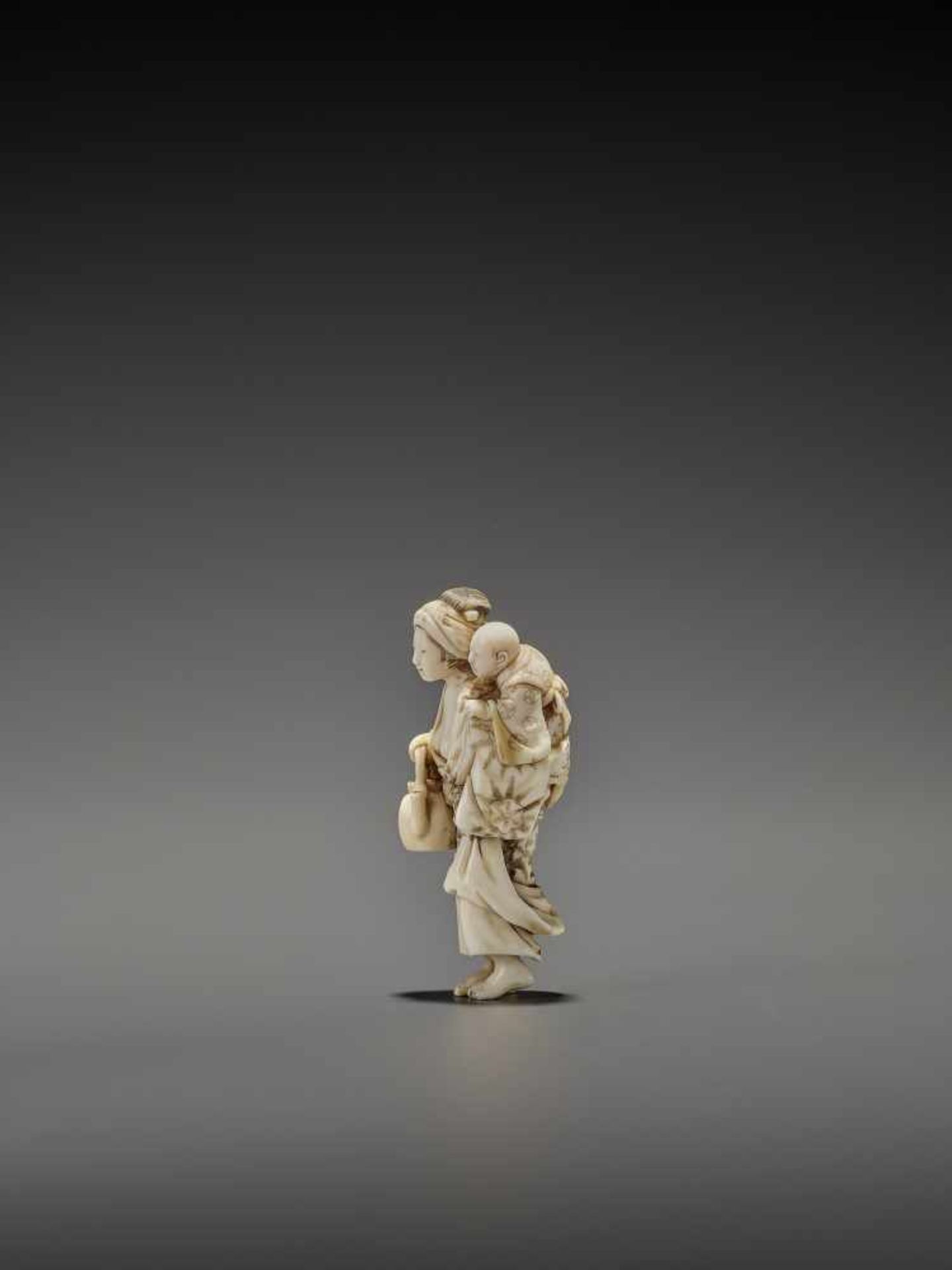 CHIKUYOSAI TOMOCHIKA: A MAGNIFICENT IVORY NETSUKE OF A MOTHER WITH CHILD By Chikuyosai Tomochika, - Image 5 of 10