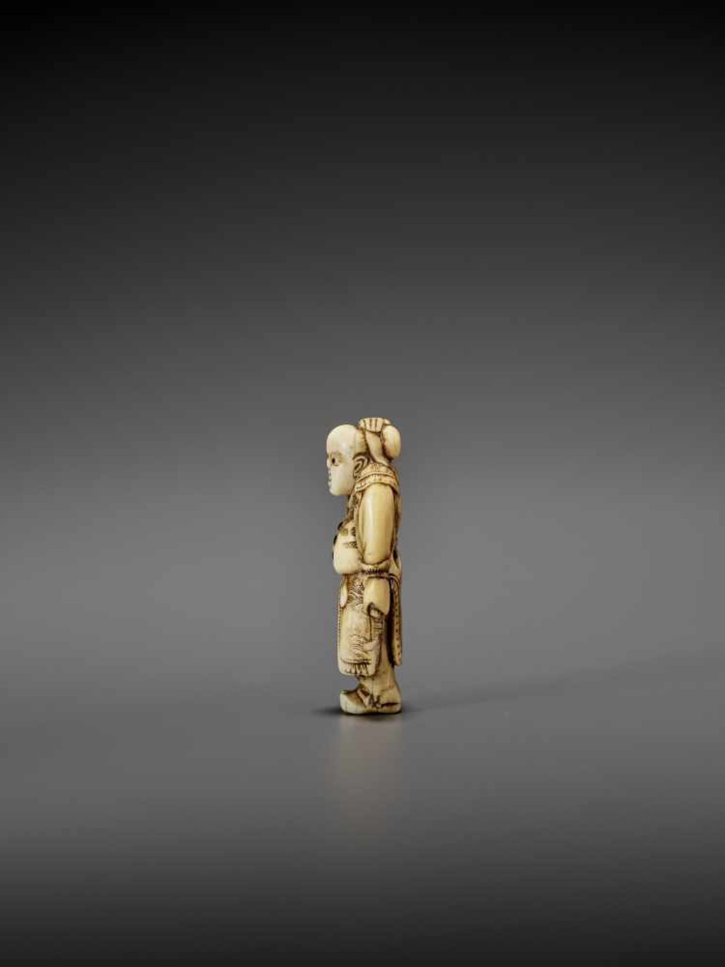 AN IVORY NETSUKE OF A CHINESE BOY UnsignedJapan, early 19th century, Edo period (1615-1868)Depicting - Image 4 of 7