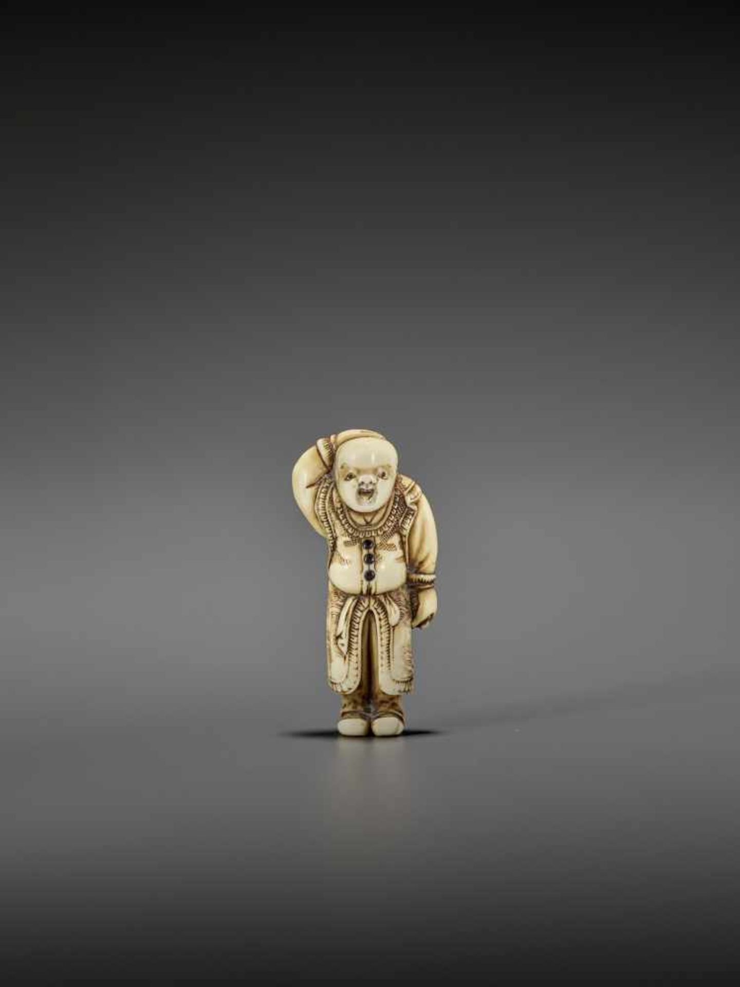 AN IVORY NETSUKE OF A CHINESE BOY UnsignedJapan, early 19th century, Edo period (1615-1868)Depicting