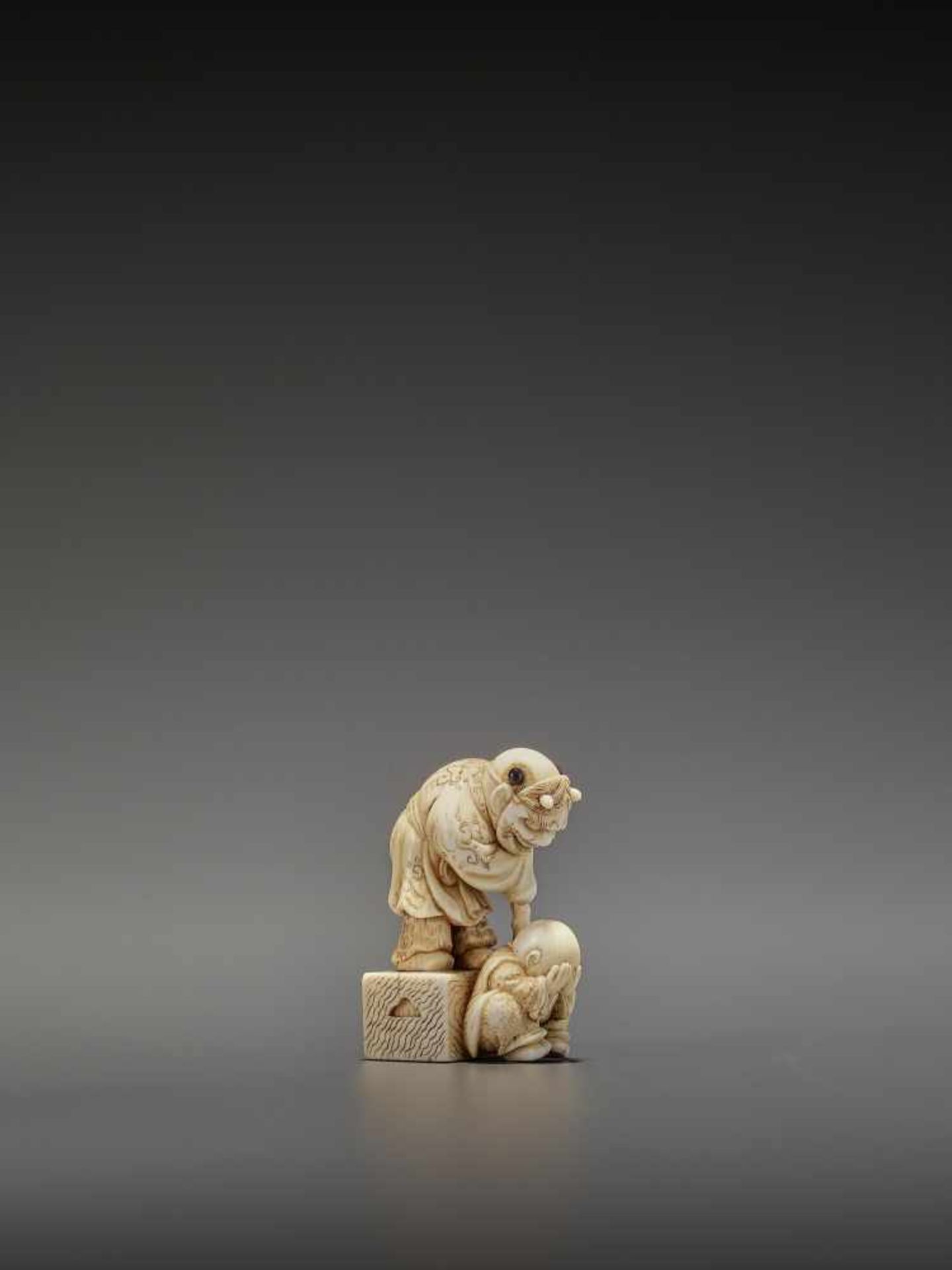 MASAKAZU: IVORY NETSUKE OF A KARAKO SCARING A YOUNG MONK By Masakazu, signed MasakazuJapan, Osaka, - Image 7 of 11