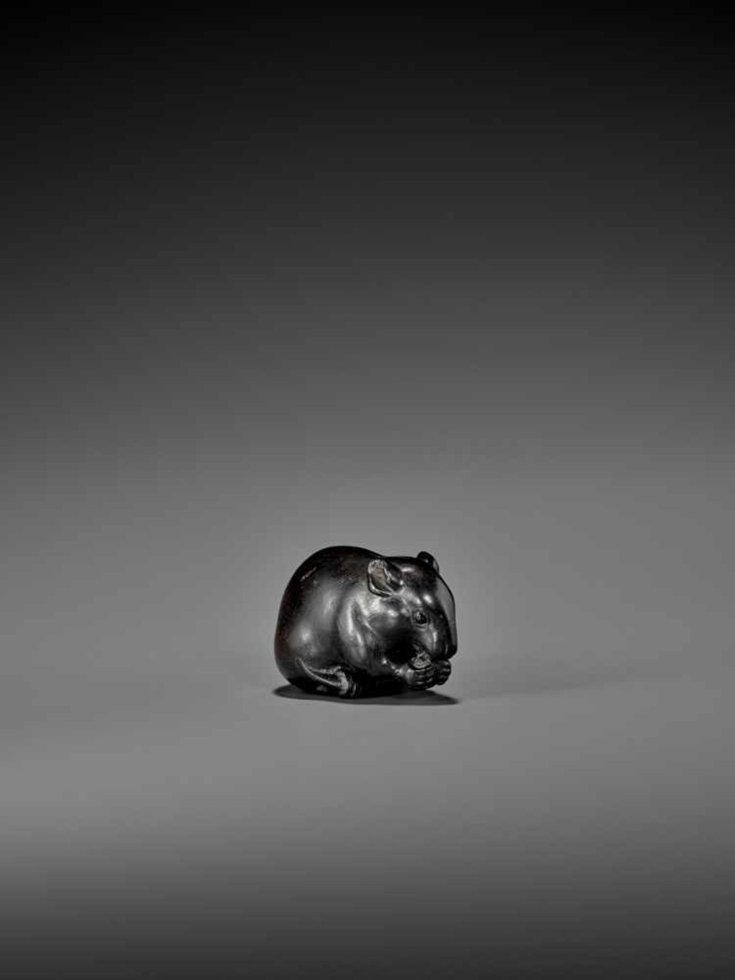 OKATORI: A RARE AND EXCELLENT EBONY WOOD NETSUKE OF A HUNGRY RAT By Okatori, signed OkatoriJapan, - Image 3 of 11