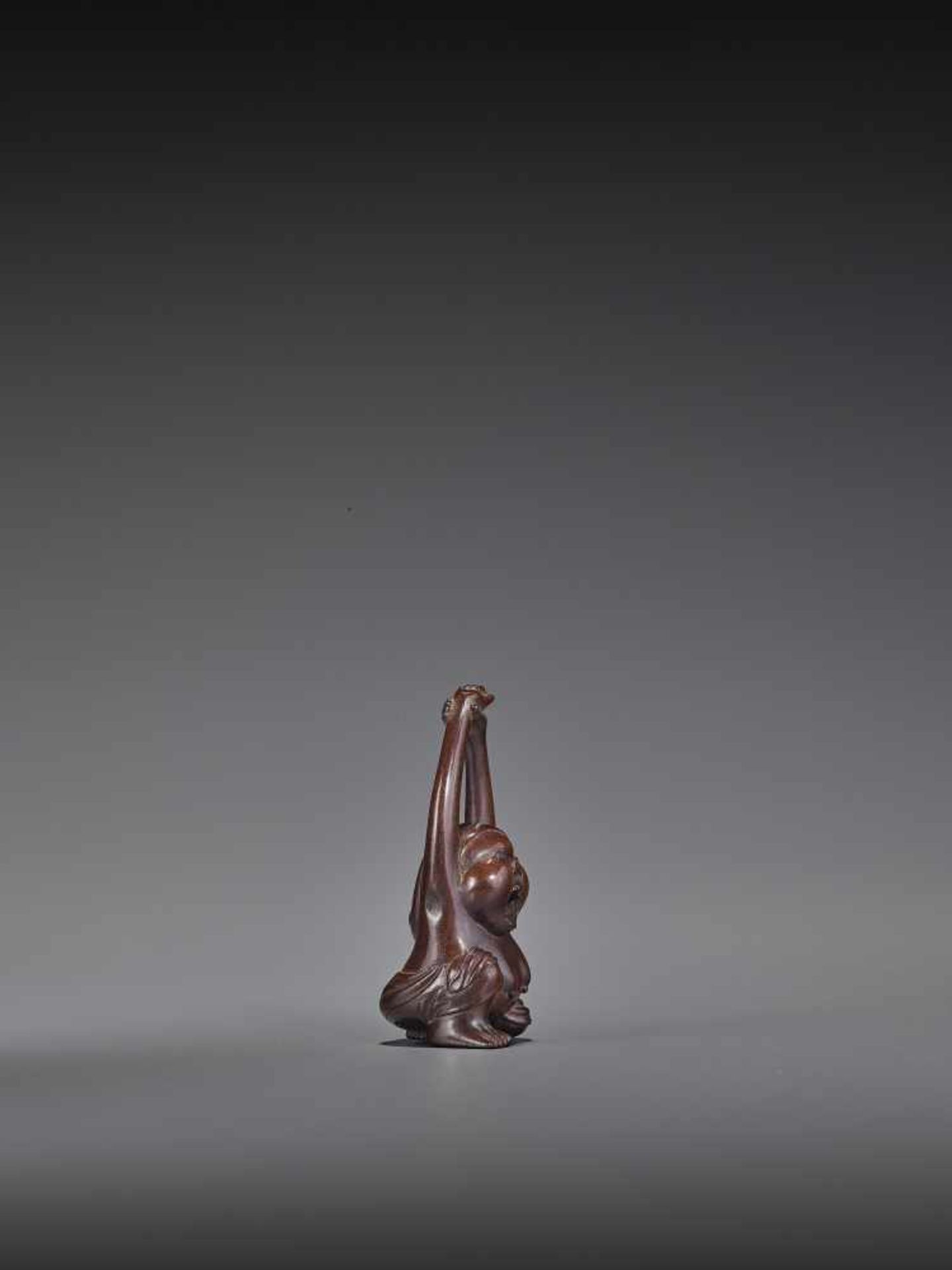 MASAKAZU: A FINE WOOD NETSUKE OF A YAWNING OKAME By Masakazu, signed MasakazuJapan, Gifu, 19th - Image 6 of 10