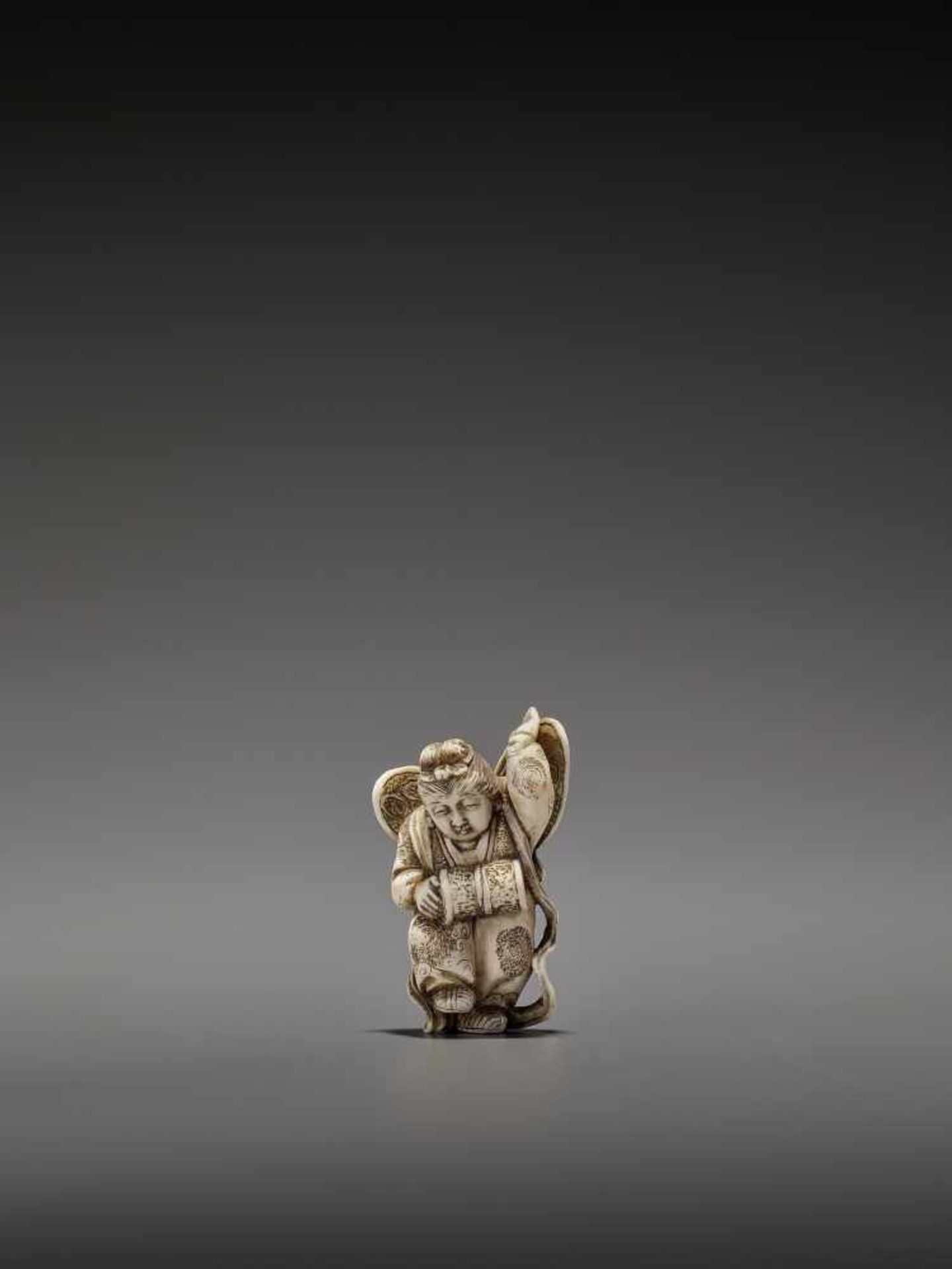 MASAHIRO: A VERY RARE IVORY NETSUKE OF A BUTTERFLY DANCER, KOCHO NO MAI By Masahiro, signed