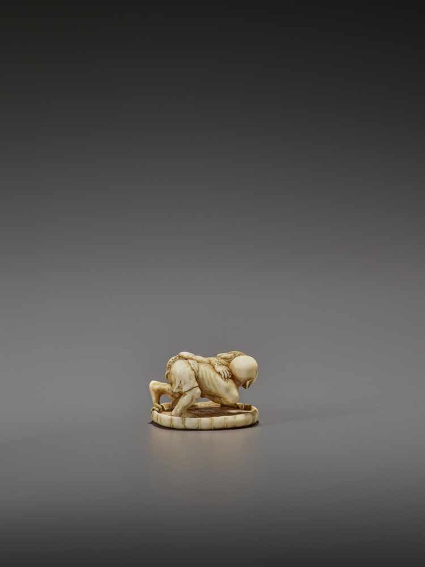 HO RAKUMIN: A FINE IVORY NETSUKE OF JIZO WRESTLING AN ONI By Ho Rakumin, signed Ho Rakumin with - Image 6 of 11