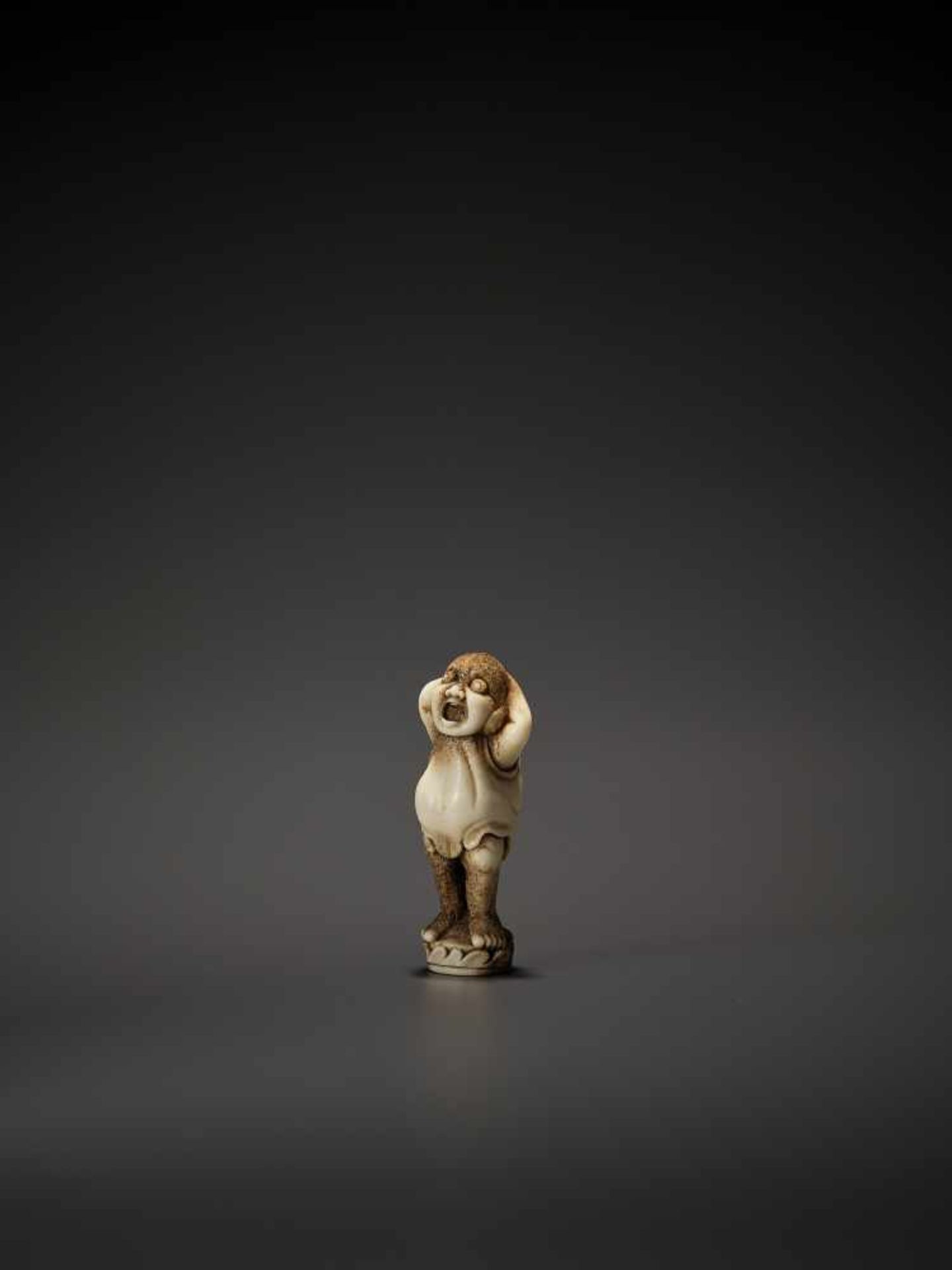 A BRILLIANT STAG ANTLER NETSUKE OF A YAWNING DARUMA UnsignedJapan, 19th century, Edo period (1615- - Image 3 of 10