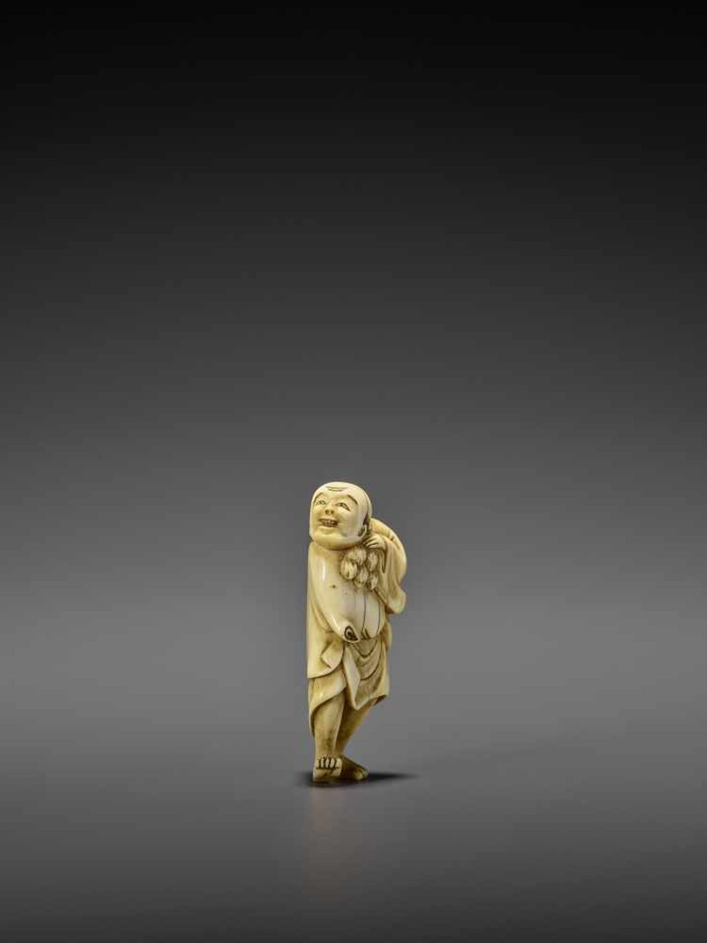 AN IVORY NETSUKE OF A PERSIMMON MERCHANT UnsignedJapan, early 19th century, Edo period (1615-1868) - Image 8 of 10