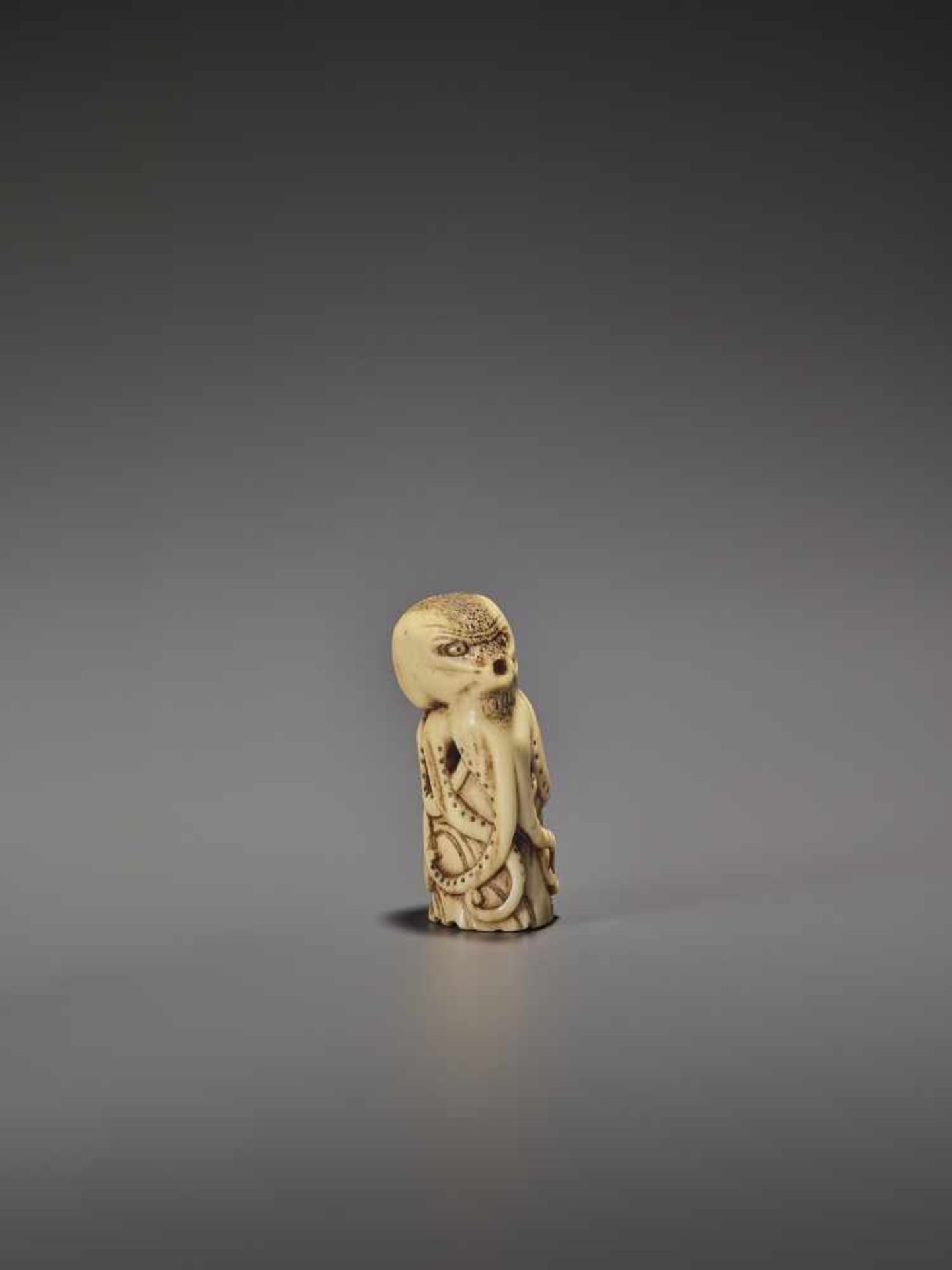 A RARE STAG ANTLER NETSUKE OF AN OCTOPUS UnsignedJapan, early 19th century, Edo period (1615-1868)