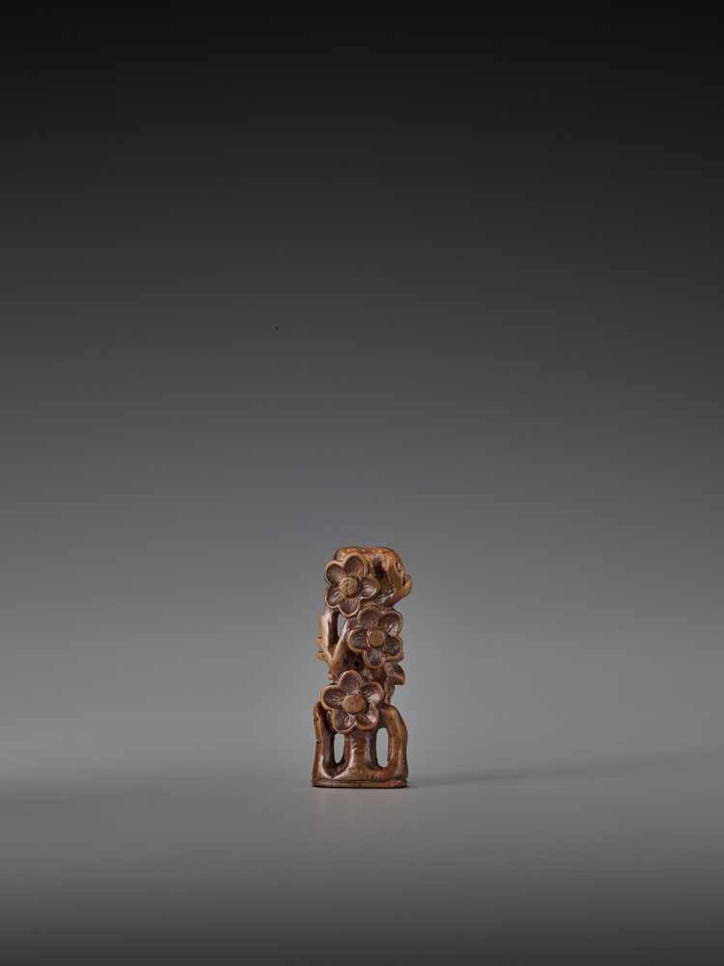 A RARE WOOD NETSUKE OF THE THREE FRIENDS OF WINTER UnsignedJapan, 19th century, Edo period (1615-