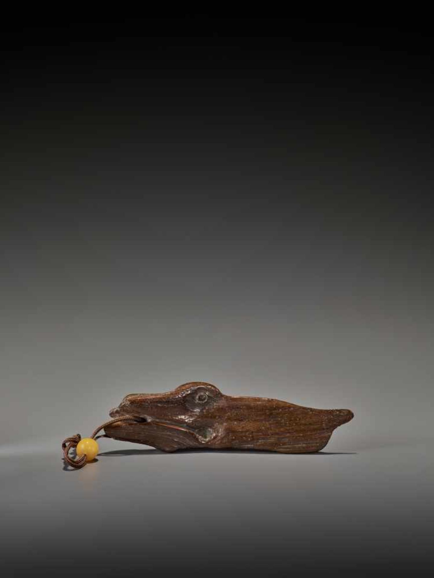 A RARE 17TH CENTURY DRIFTWOOD NETSUKE OF A LARGE FISH UnsignedJapan, 17th century, Edo period (