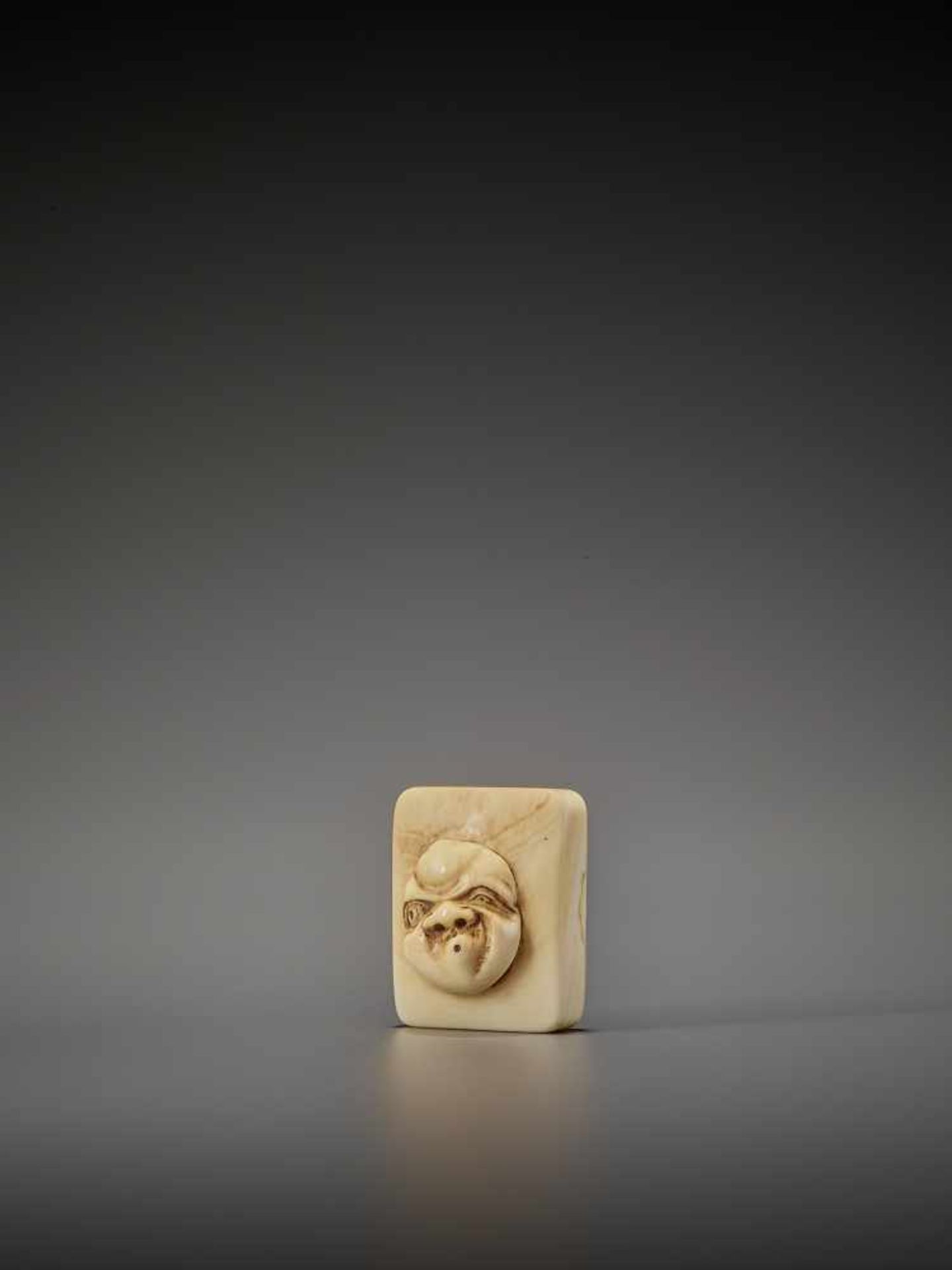 DORAKU: AN IVORY NETSUKE OF A MASK BOX WITH USOFUKI By Doraku(Sai), signed DorakuJapan, Osaka, - Image 3 of 10