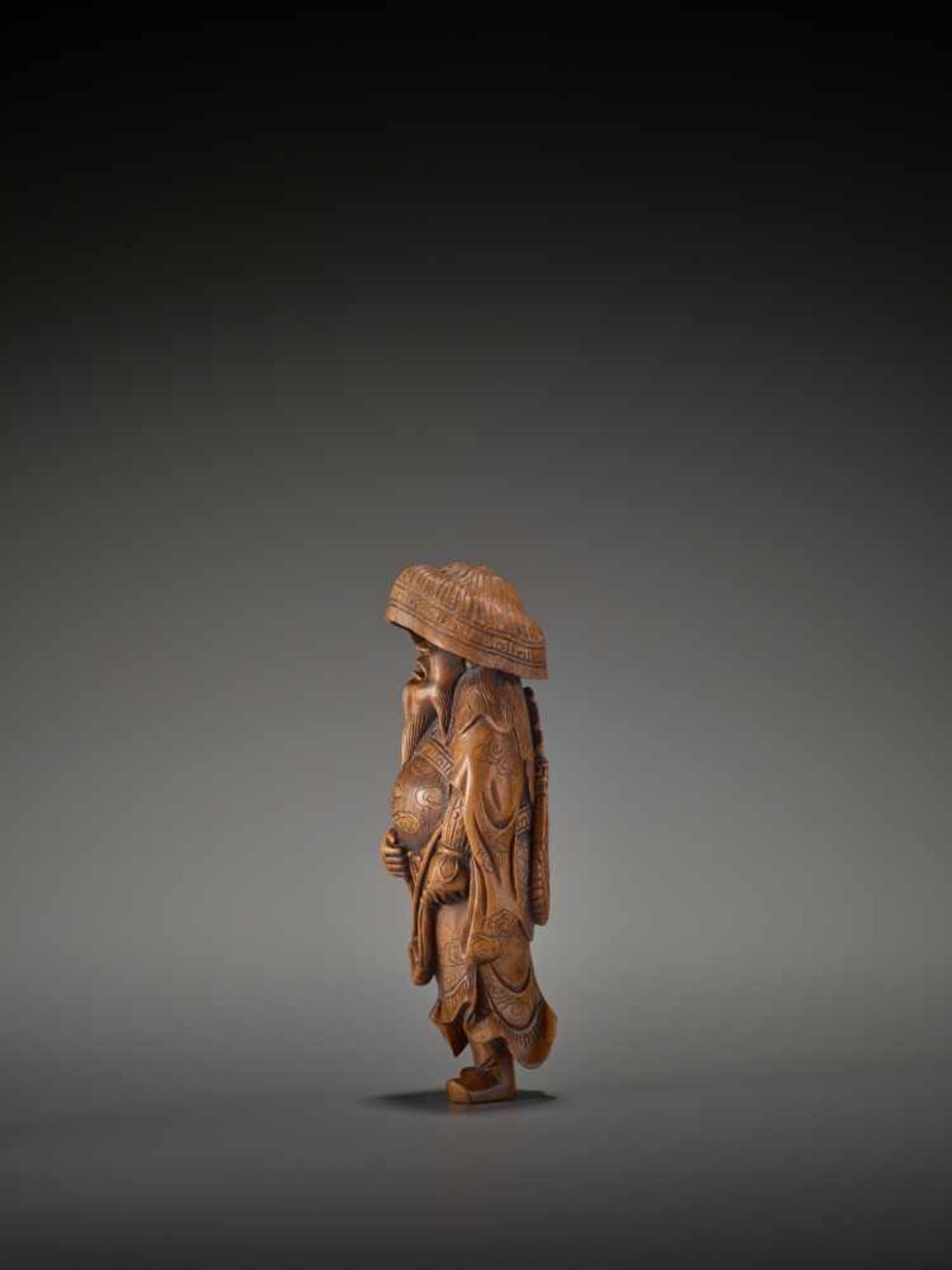 A LARGE WOOD FIGURE OF A TARTAR ARCHER Signed Tomokazu20th centuryThe wood of a reddish tone and - Image 6 of 12