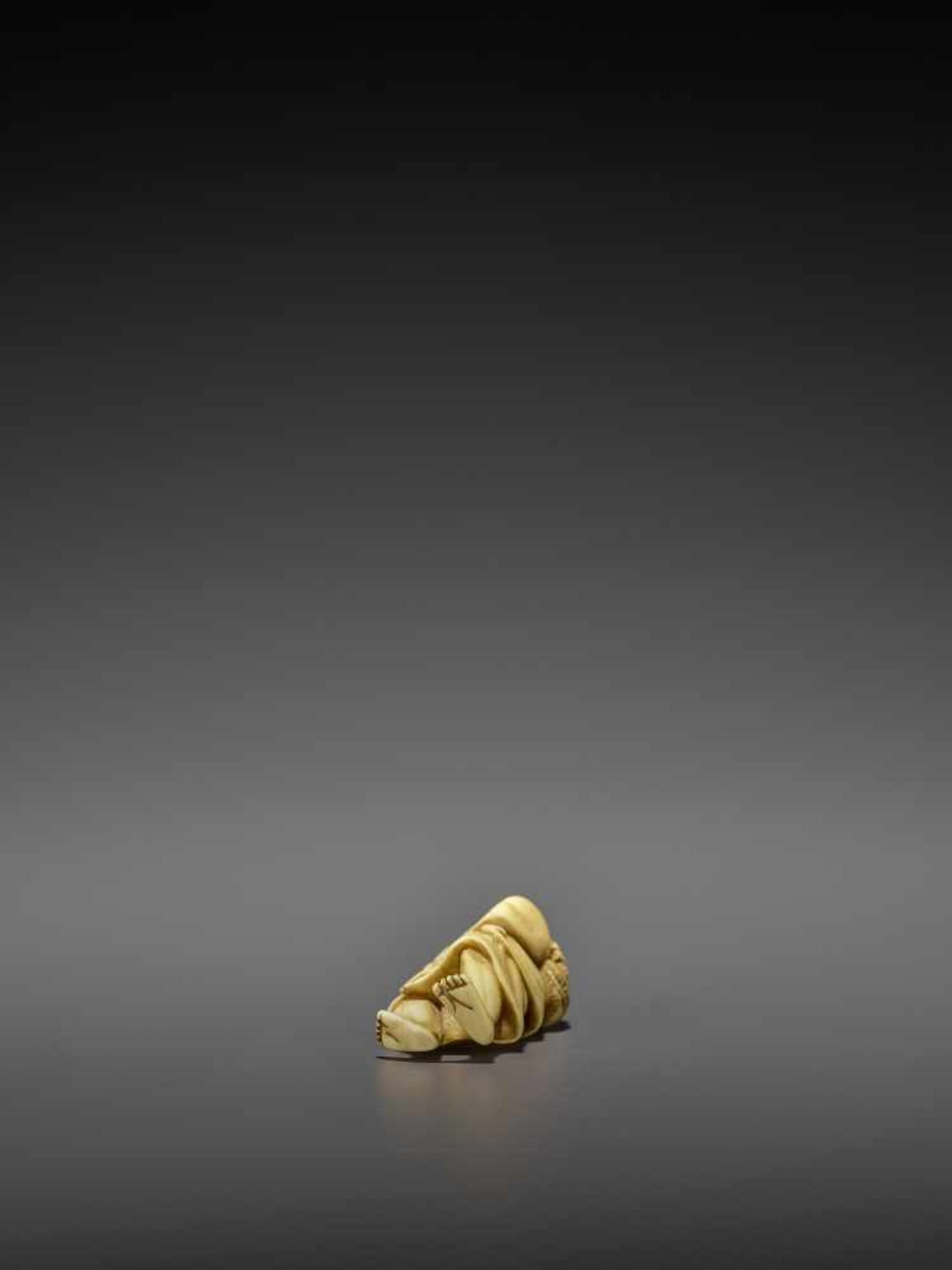 AN IVORY NETSUKE OF A PERSIMMON MERCHANT UnsignedJapan, early 19th century, Edo period (1615-1868) - Image 9 of 10