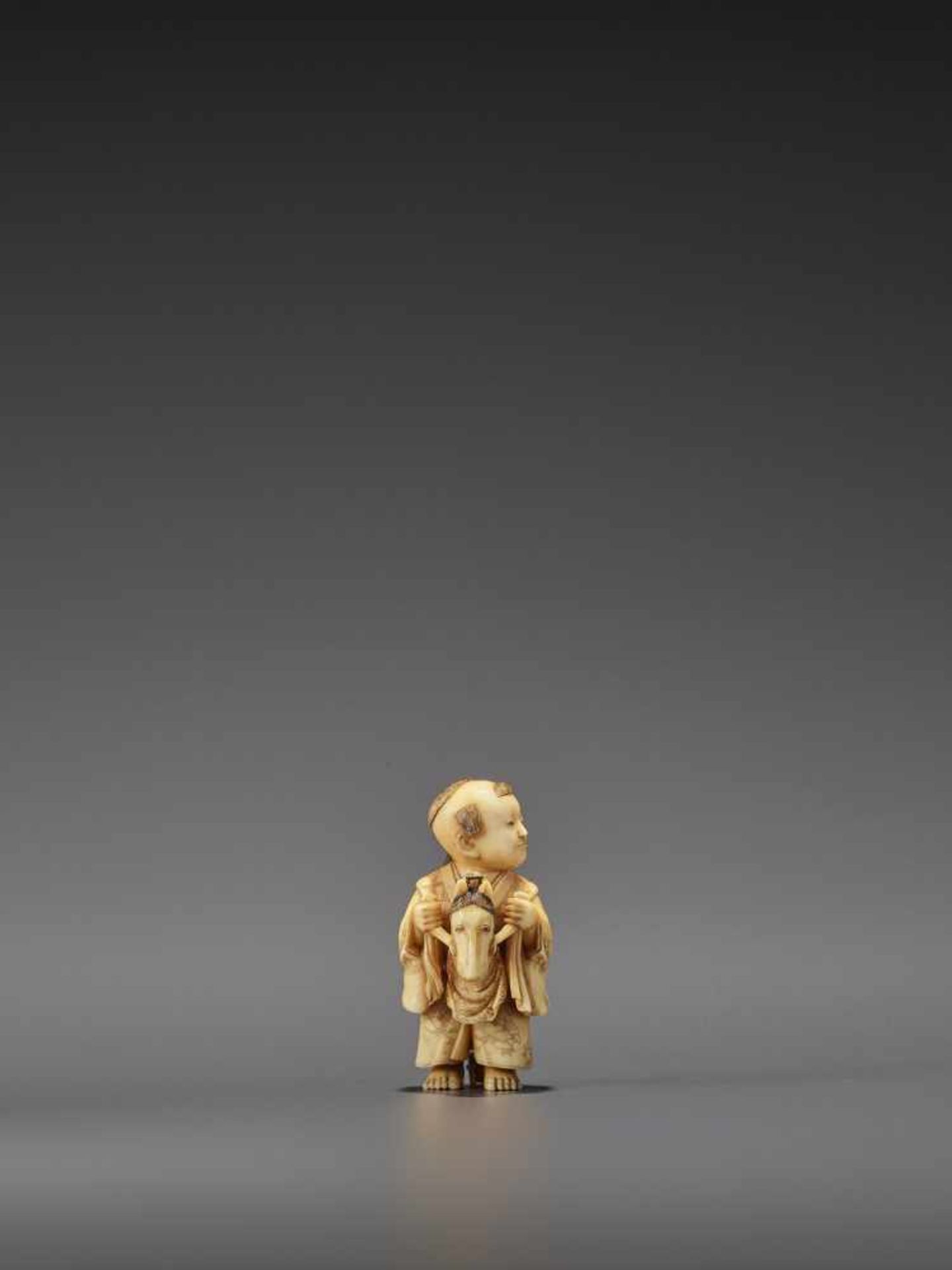 RYOMIN: A VERY FINE IVORY NETSUKE OF A BOY WITH HOBBY HORSE By Ono Ryomin, signed Ryomin with - Image 6 of 11