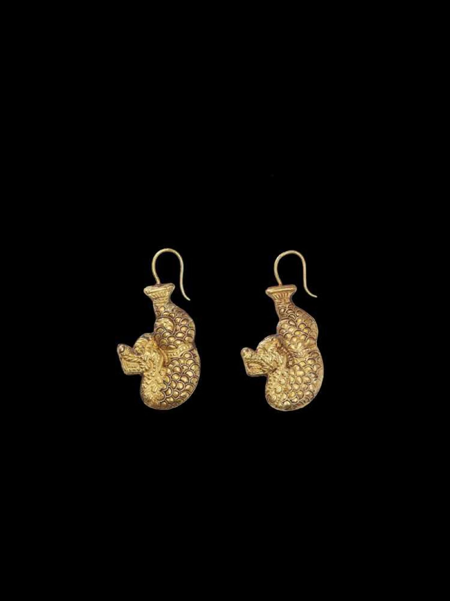 A PAIR OF CHAM REPOUSSÉ GOLD EAR ORNAMENTS IN THE FORM OF MAKARA Champa, Thap Mam Style, 12th – 14th