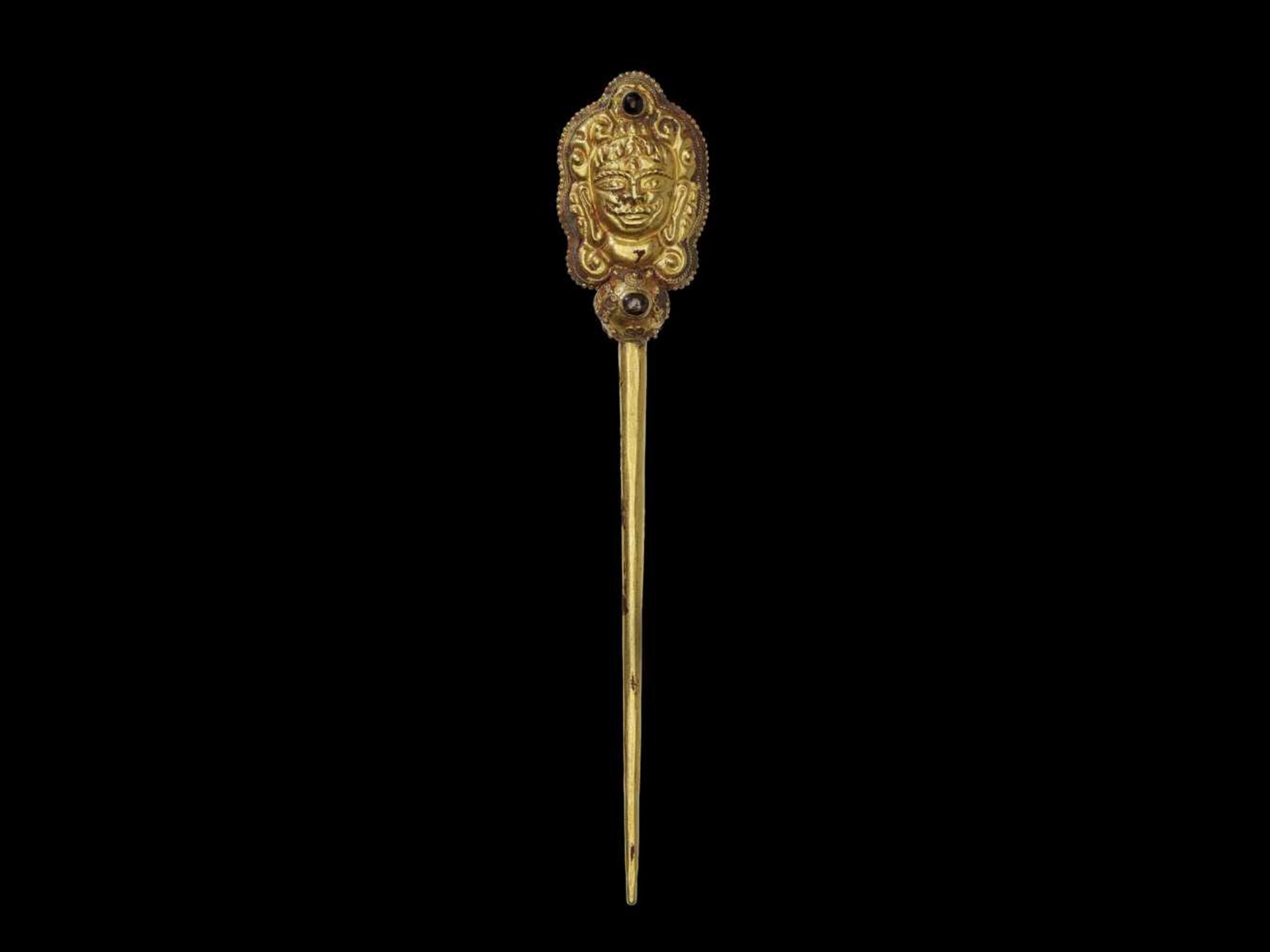 A CHAM GOLD HAIRPIN WITH THE HEAD OF SHIVA AND GEMSTONES Central Cham kingdom, most probably Vijaya,
