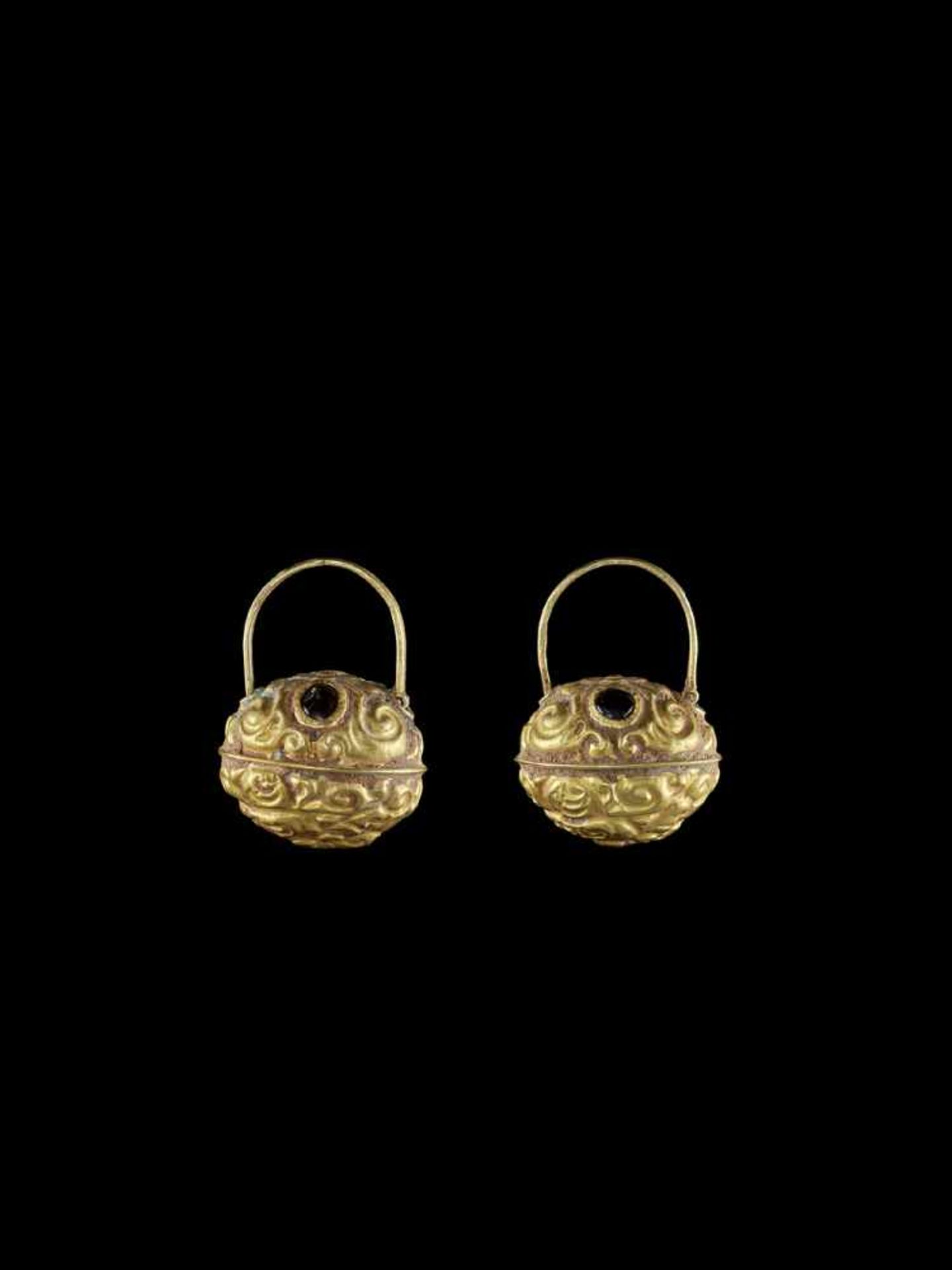 A PAIR OF BELL-SHAPED CHAM REPOUSSÉ GOLD EAR ORNAMENTS Champa, classical period, 10th – 12th