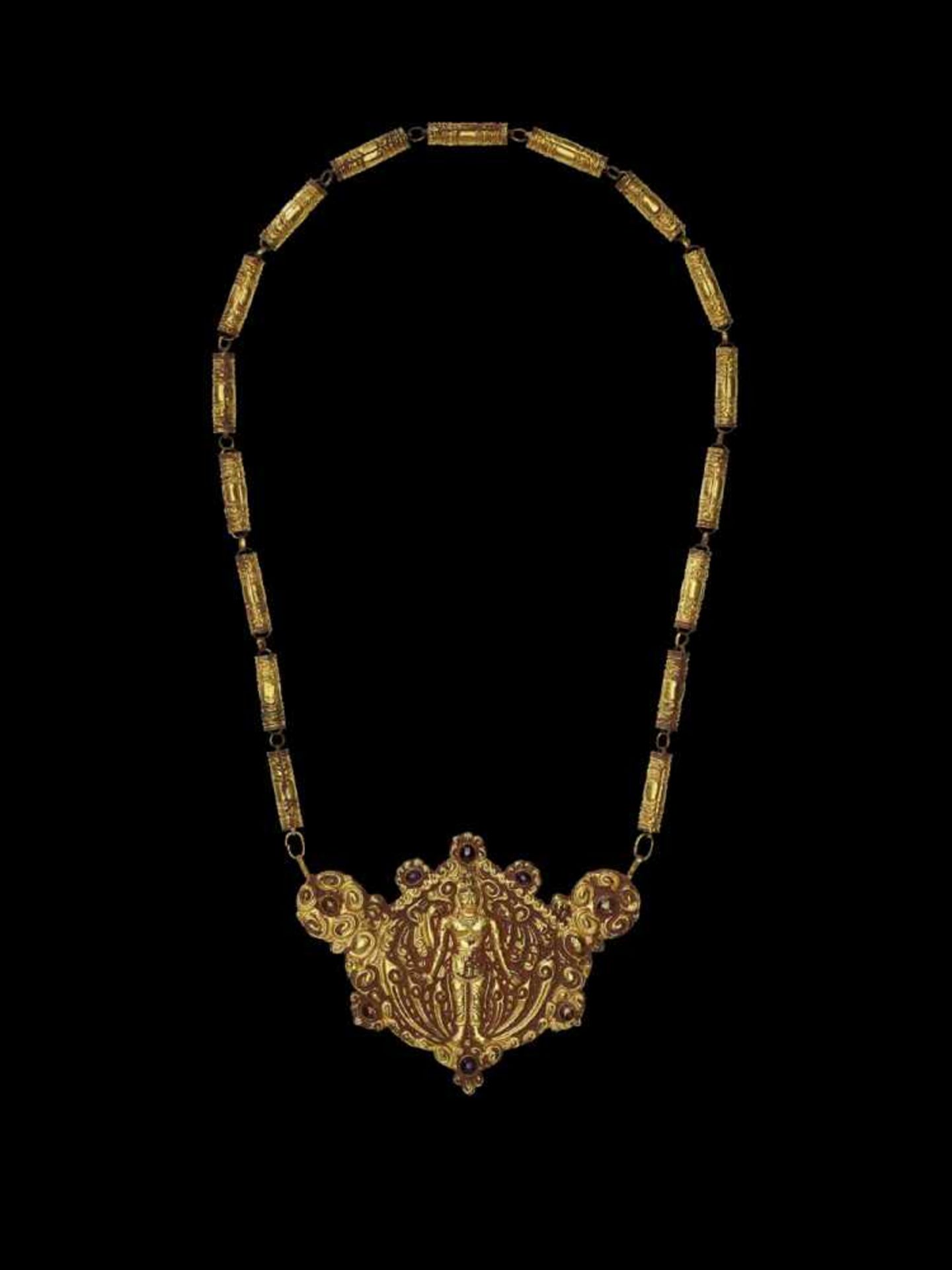 A CHAM REPOUSSÉ GOLD NECKLACE WITH A PECTORAL DEPICTING UMA Central Cham kingdom, classical