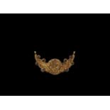 A CHAM REPOUSSÉ GOLD CRESCENT MOON PECTORAL DEPICTING KALA Central or southern Cham kingdom,