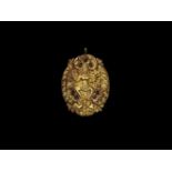 A CHAM REPOUSSÉ GOLD PENDANT DEPICTING INDRA DANCING Central Cham kingdom, classical period,