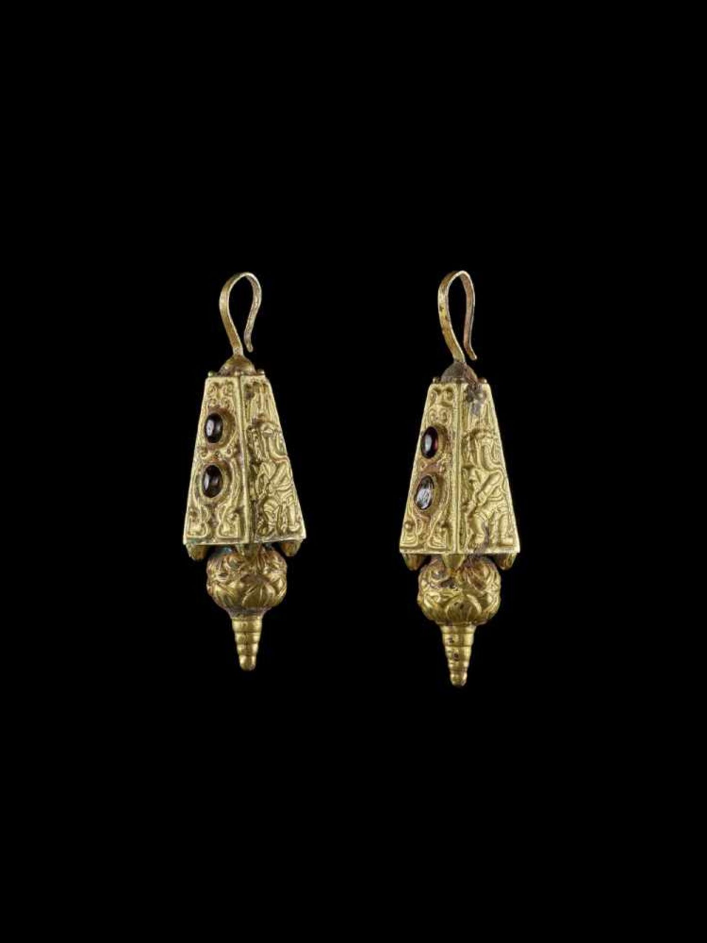 A PAIR OF CHAM REPOUSSÉ GOLD EAR ORNAMENTS WITH GANESHA DANCING Champa, c. 10th – 12th century.