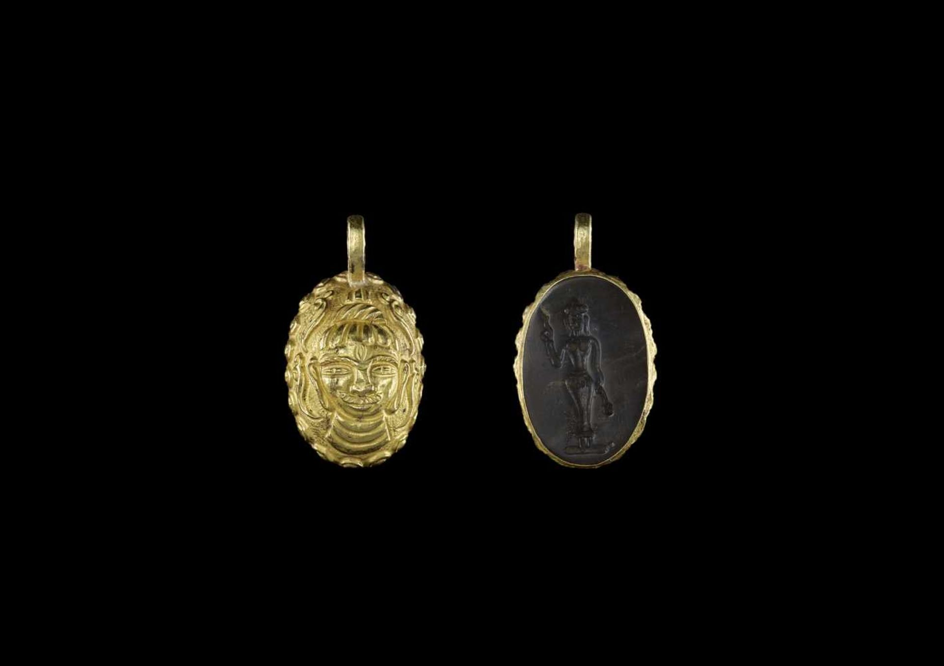A CHAM GOLD PENDANT WITH STONE INTAGLIO DEPICTING SHIVA AND A HINDU DEITY Champa, early classical