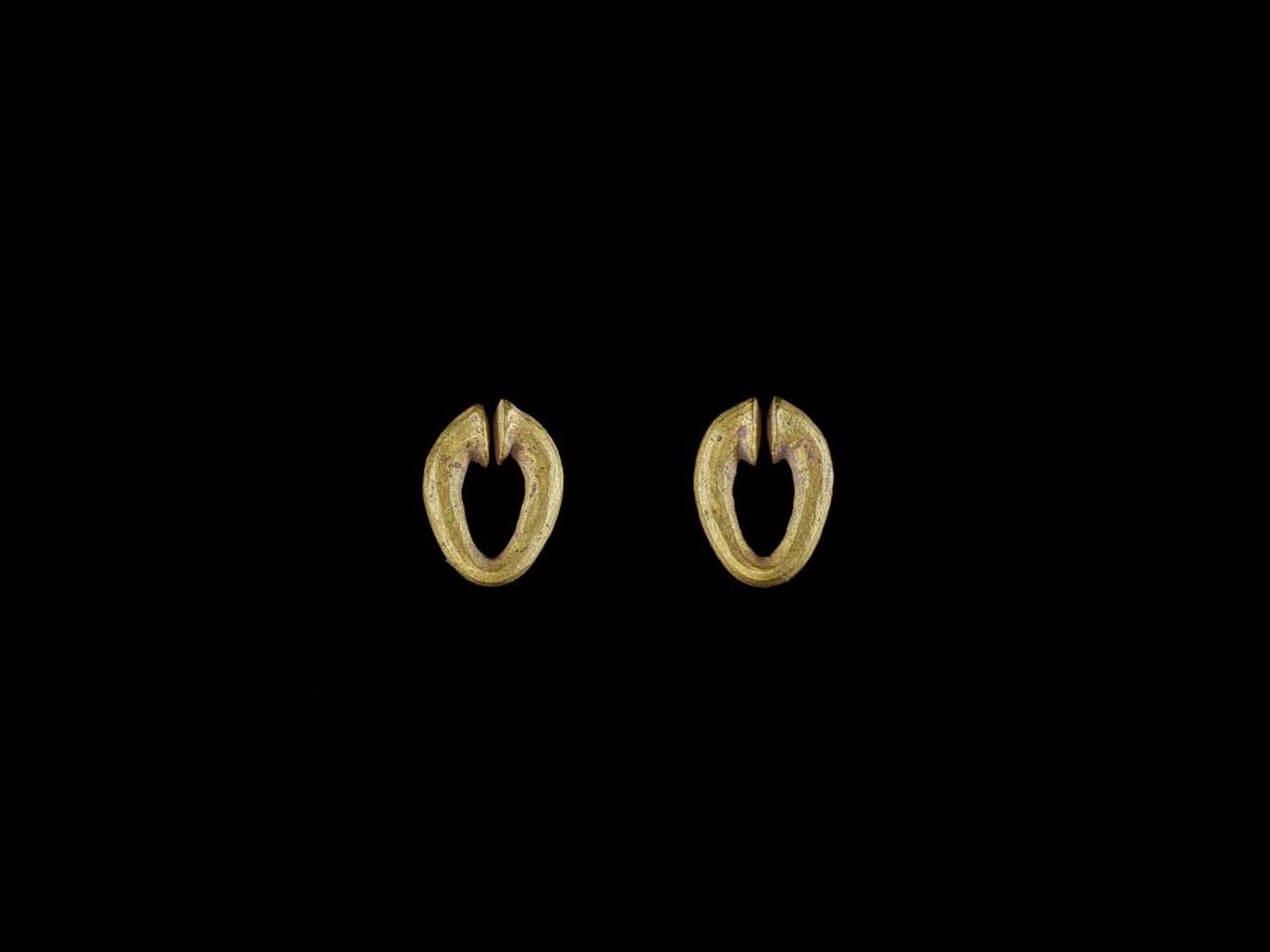 A PAIR OF GOLD EAR ORNAMENTS, ÓC EO CULTURE Óc Eo Culture, Mekong Delta, 3rd – 7th century. The