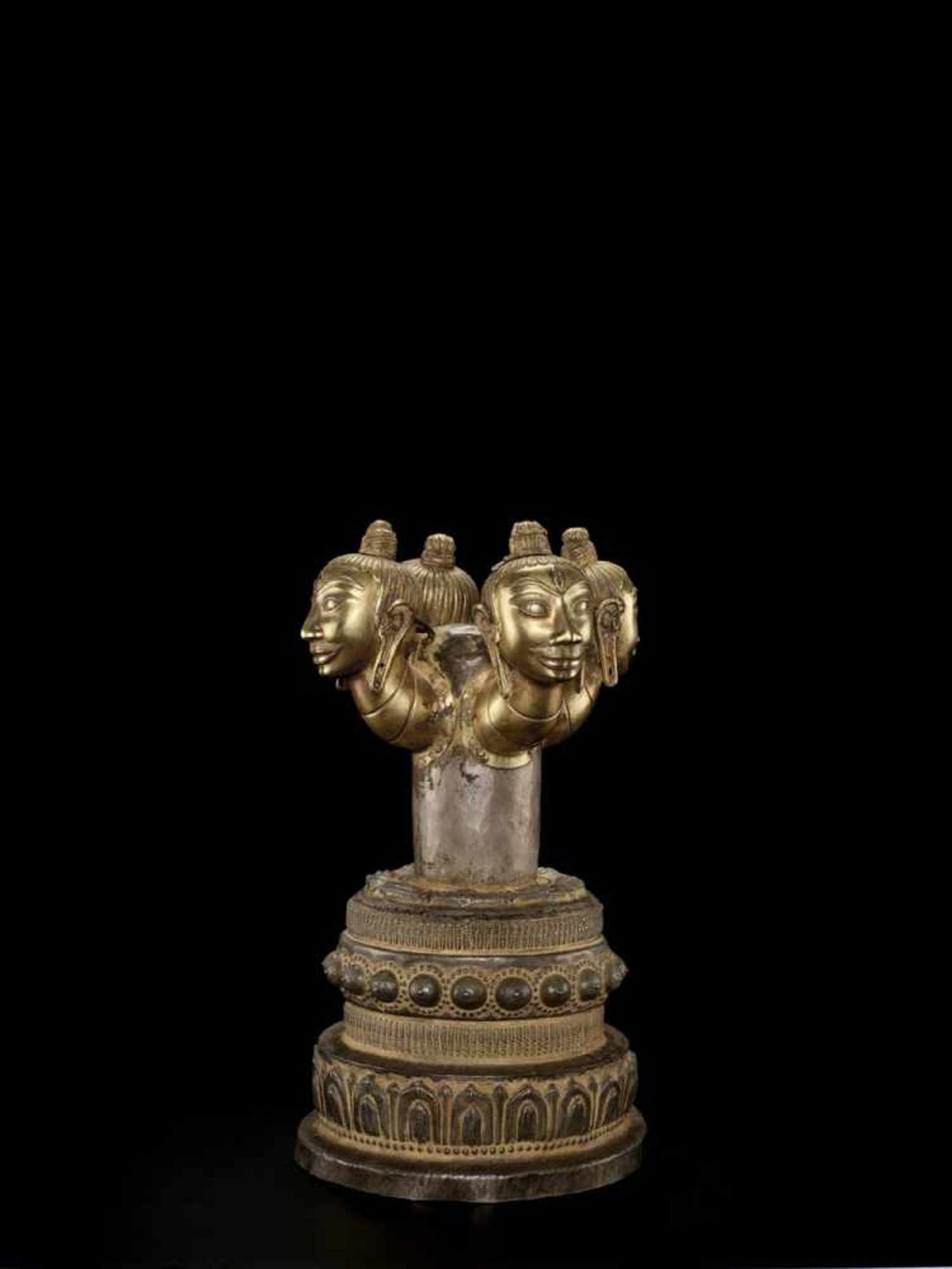 zurückgezogen / withdrawn---AN EXQUISITE AND EXCEPTIONALLY RARE CHAM LINGAM WITH FOUR GOLD SHIVA