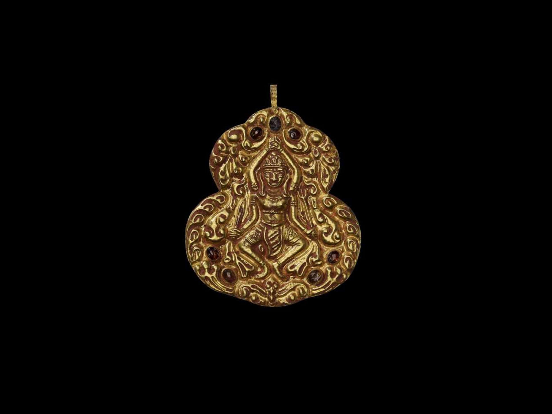 A CHAM REPOUSSÉ GOLD PENDANT DEPICTING SHIVA DANCING Central Cham kingdom, probably Vijaya,