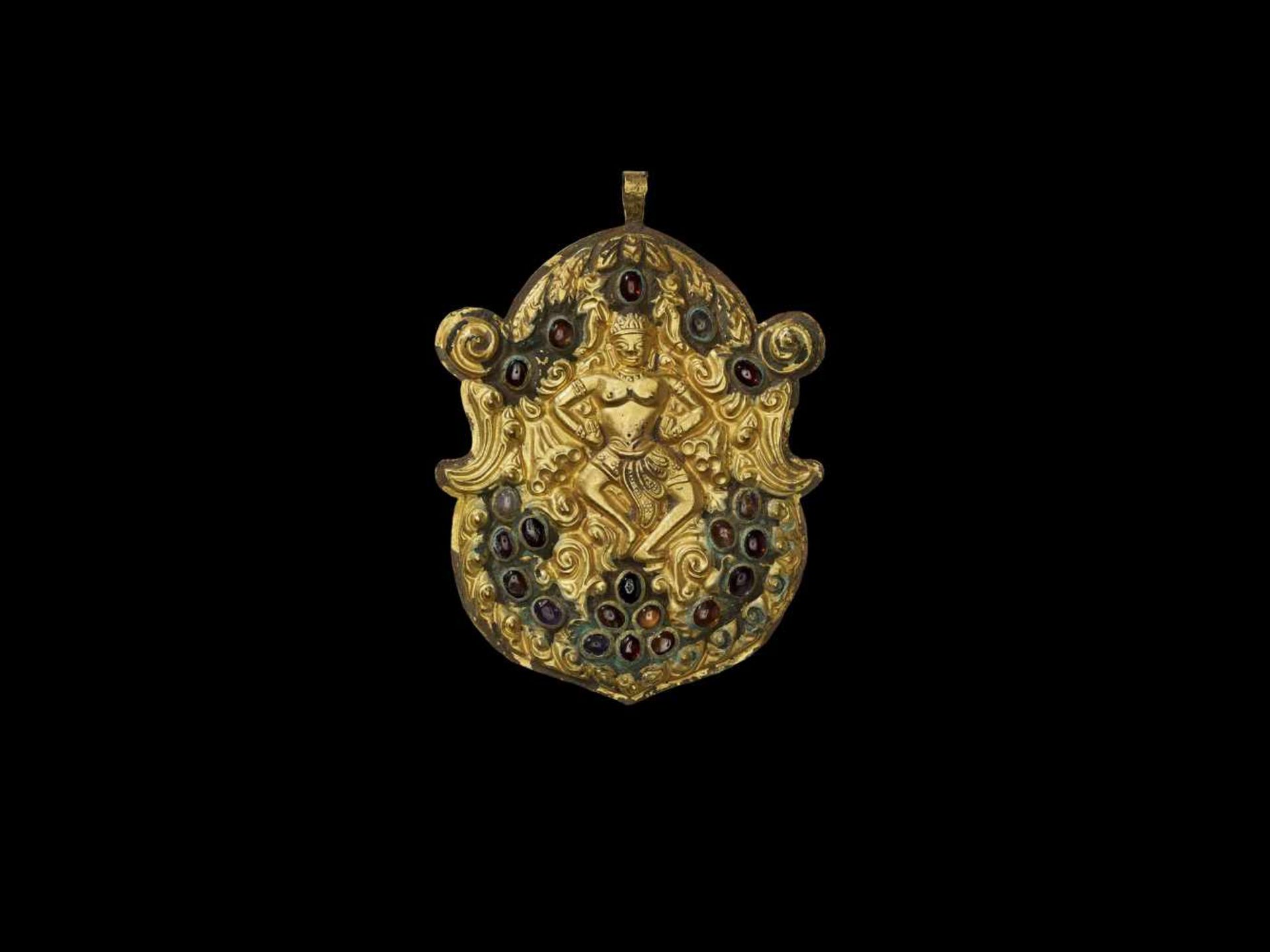 A CHAM REPOUSSÉ GOLD PECTORAL DEPICTING A DANCING HINDU GODDESS Central Cham kingdom, probably of