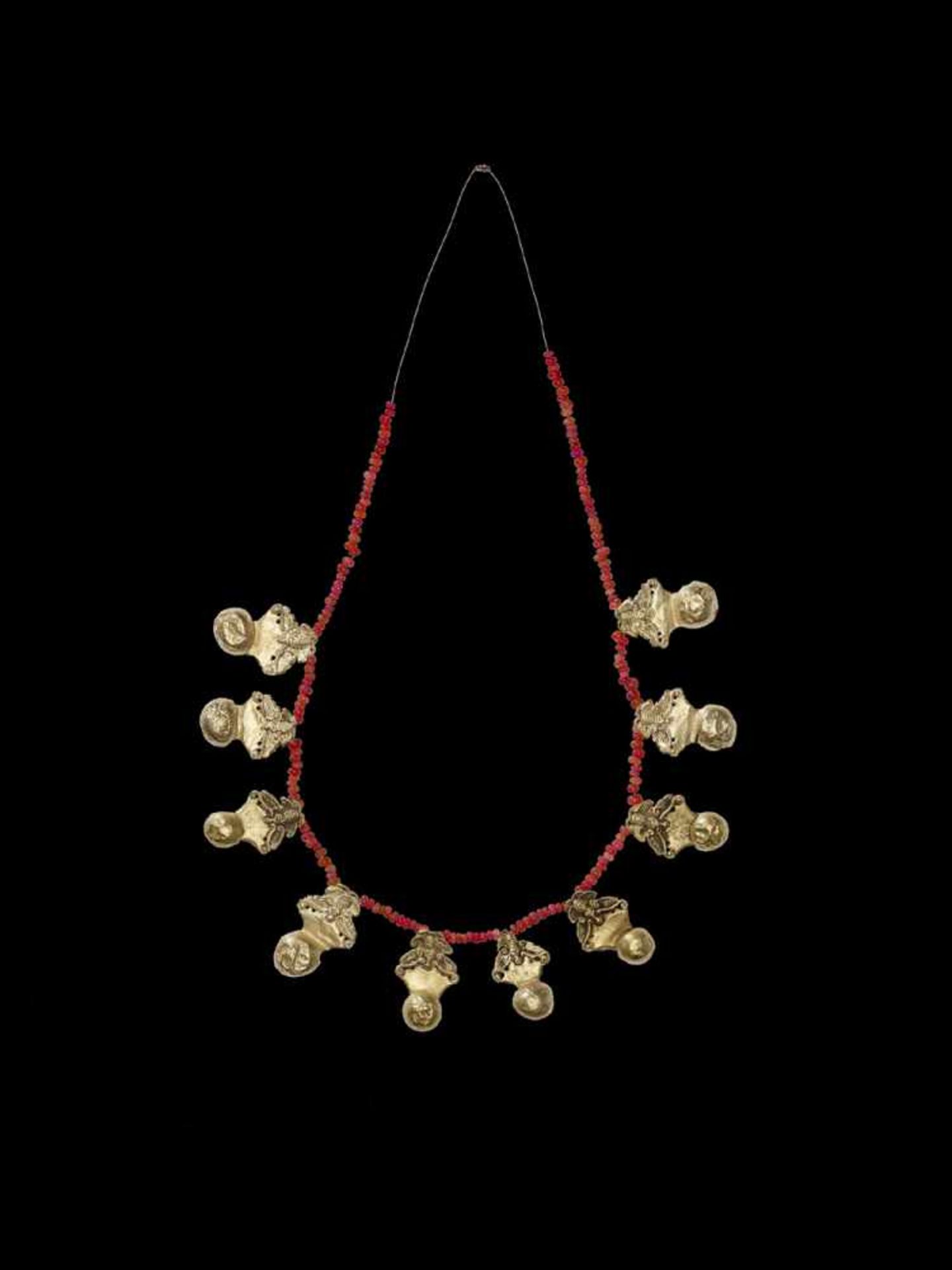 A NECKLACE WITH GOLD BUTTERFLY ORNAMENTS AND RED GLASS BEADS Northern Vietnam, first half of the