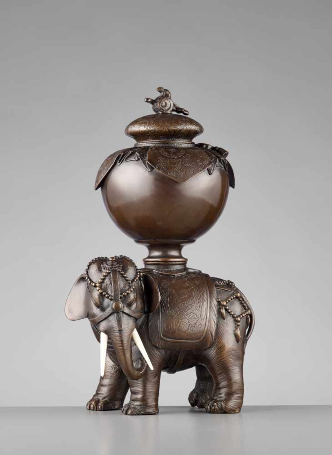 A FINE LARGE CAPARISONED ELEPHANT BRONZE KORO Japan, Meiji period (1868-1912)The pachyderm stands on