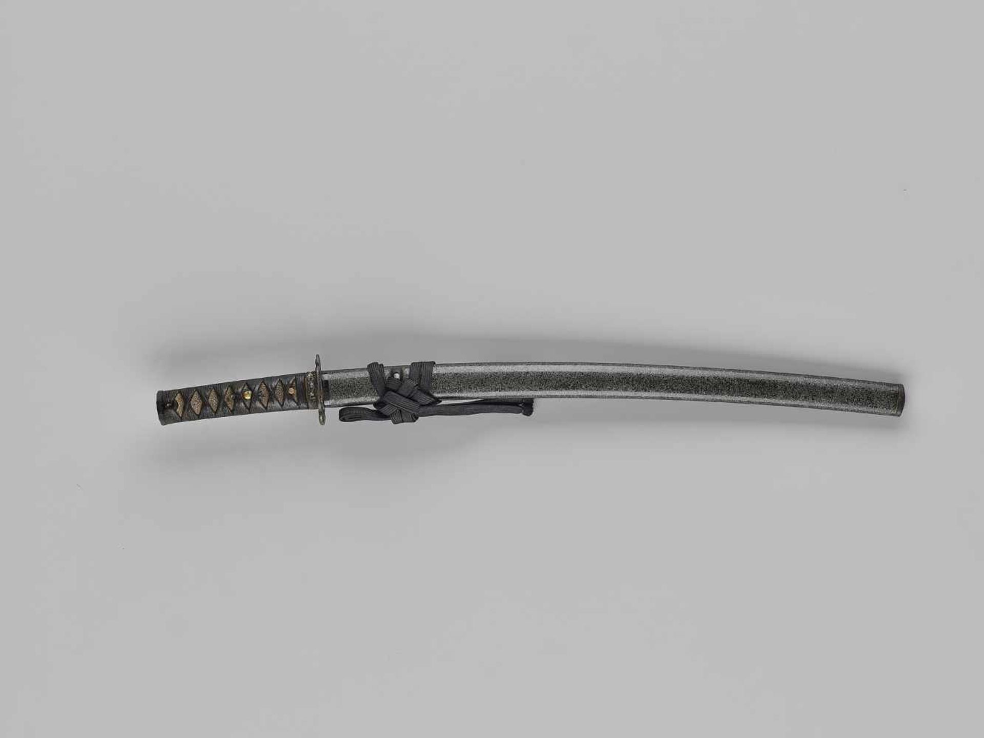 NORIMITSU: A WAKIZASHI WITH HORIMONO IN KOSHIRAE By Norimitsu, signed Washu ju Norimitsu