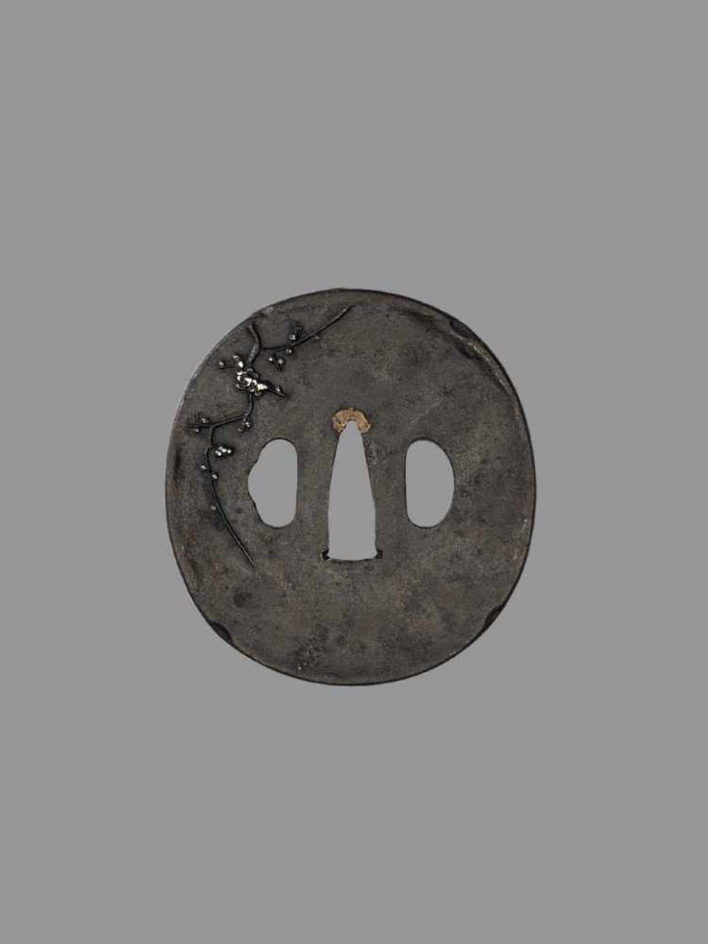 AN IRON TSUBA WITH CHERRY BLOSSOMS Japan, 17th century, Edo period (1615-1868)An iron tsuba of - Image 3 of 4