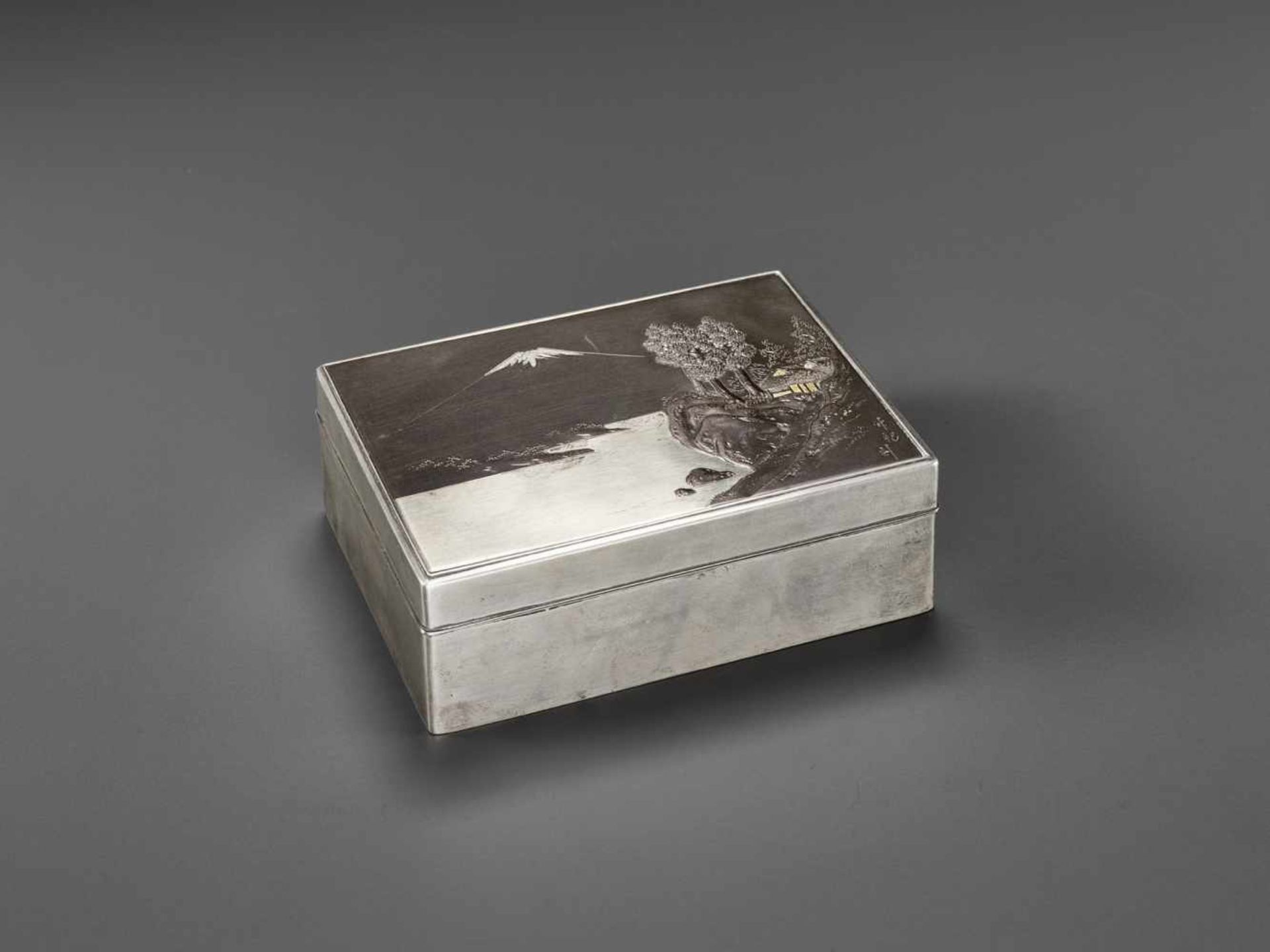 CHIKUSHIN: AN ICONIC ‘MOUNT FUJI’ SILVER BOX By Chikushin for the Miyamoto company, signed Chikushin