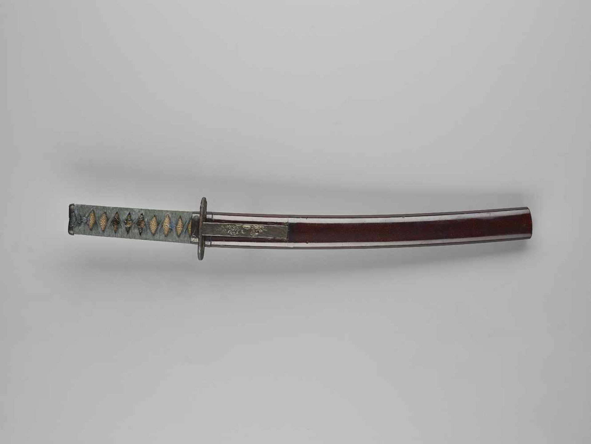 TOMOTSUGU: A TANTO IN KOSHIRAE By Tomotsugu, signed TomotsuguJapan, c. 16th to 17th centuryThe