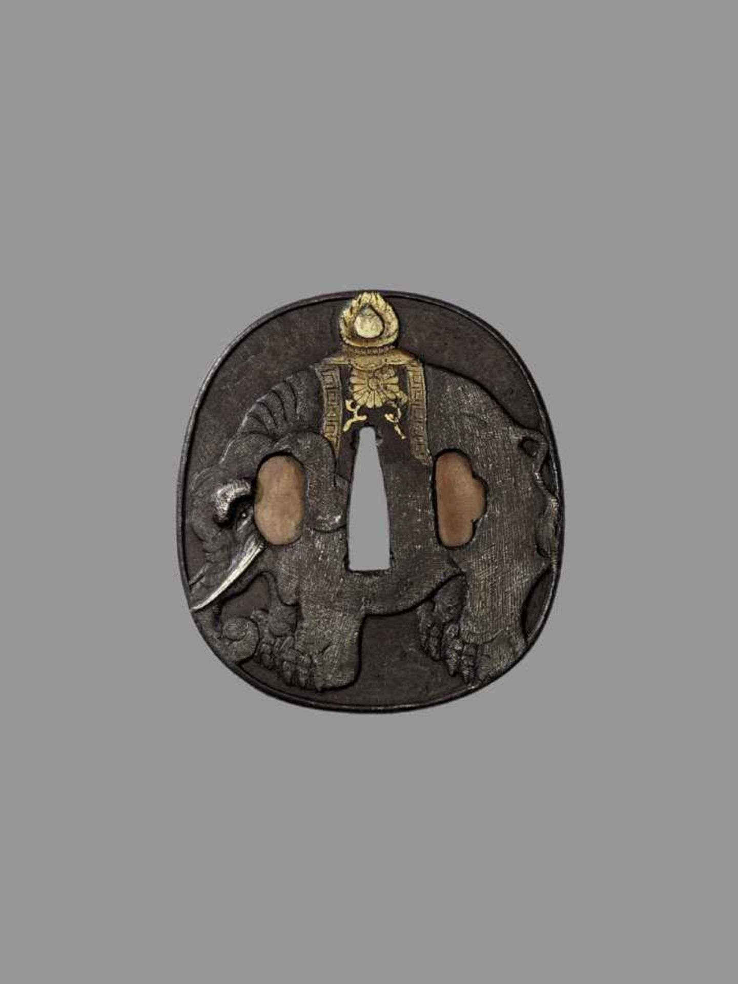 YASUCHIKA: A LARGE NARA IRON TSUBA WITH ELEPHANT Signed YasuchikaJapan, 19th century, Edo period (