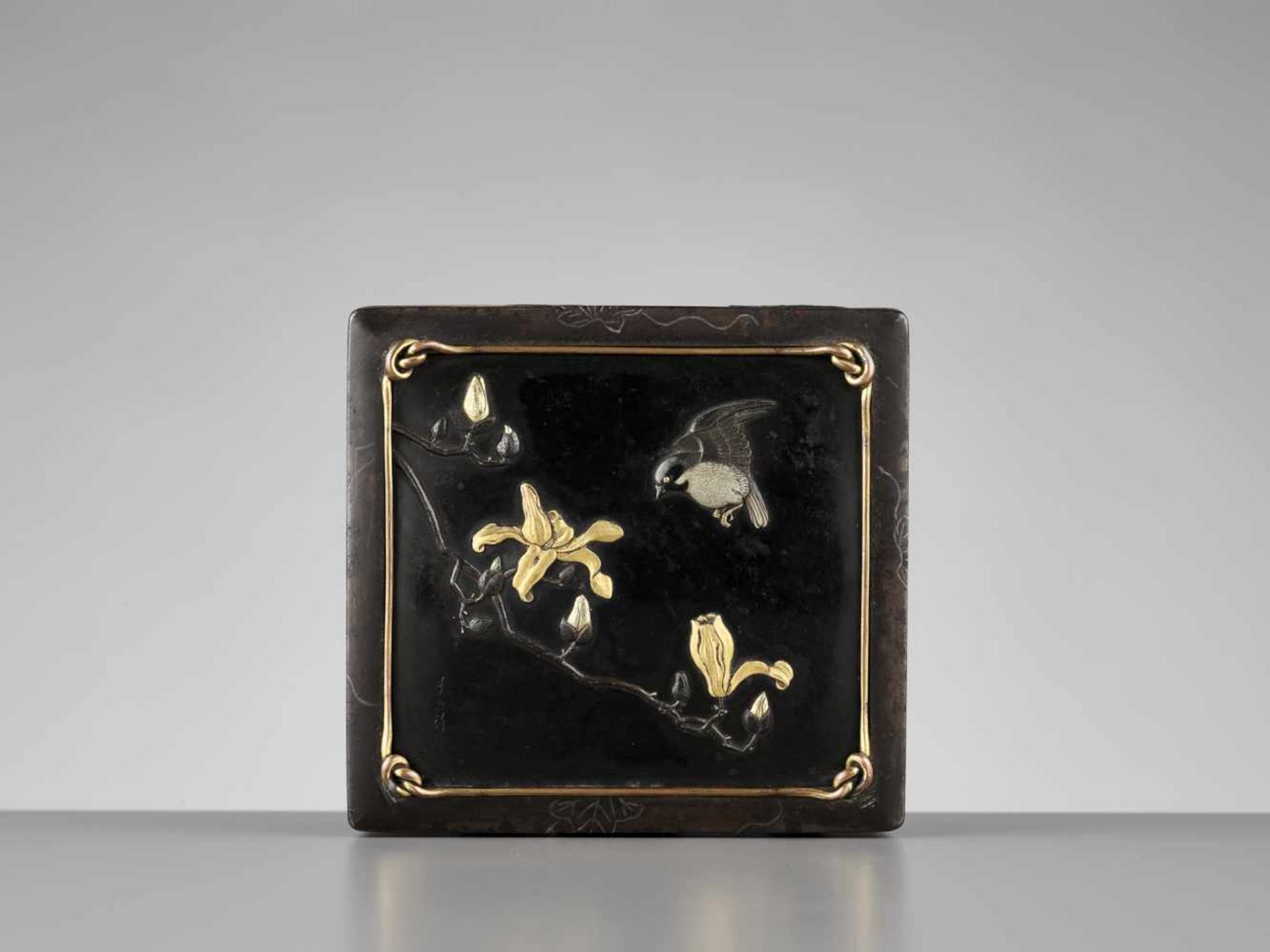 MASAYUKI: AN IRON AND GOLD BOX WITH MAGNOLIA AND SPARROW By Masayuki, signed MasayukiJapan, late